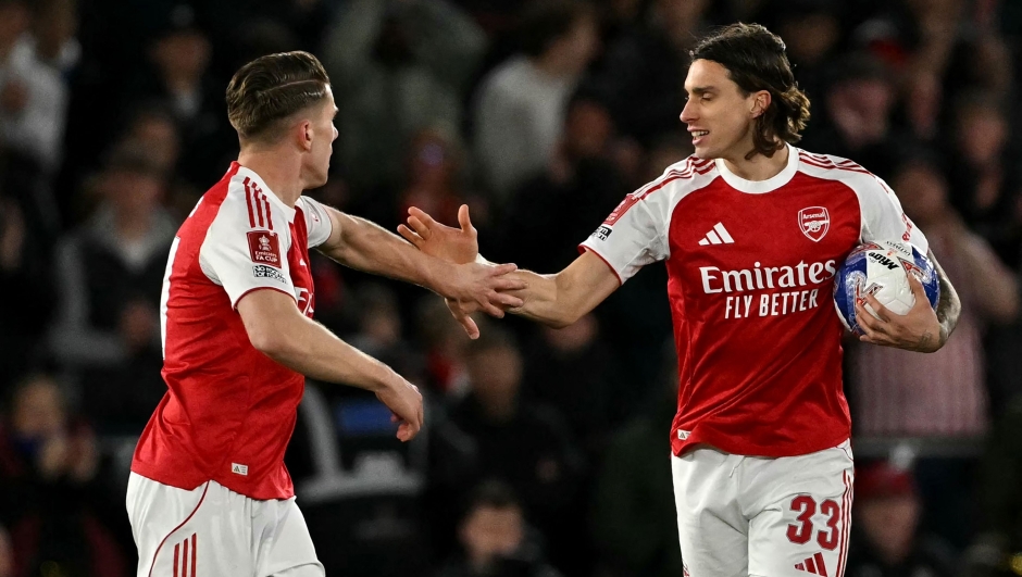 Arsenal's Swedish striker #14 Viktor Gyokeres celebrates scoring the team's first goal with Arsenal's Italian defender #33 Riccardo Calafiori (R) during the English FA Cup quarter final football match between Southampton and Arsenal at St Mary's Stadium in Southampton, southern England on April 4, 2026. (Photo by Glyn KIRK / AFP) / RESTRICTED TO EDITORIAL USE. No use with unauthorized audio, video, data, fixture lists, club/league logos or 'live' services. Online in-match use limited to 120 images. An additional 40 images may be used in extra time. No video emulation. Social media in-match use limited to 120 images. An additional 40 images may be used in extra time. No use in betting publications, games or single club/league/player publications. /