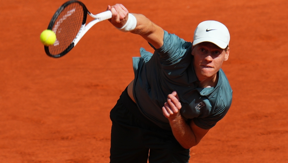 Jannik Sinner of Italy serves the ball to Cameron Norrie of Britain during their round of 16 match at the Madrid Open tennis tournament in Madrid, Tuesday, April 28, 2026. (AP Photo/Manu Fernandez)