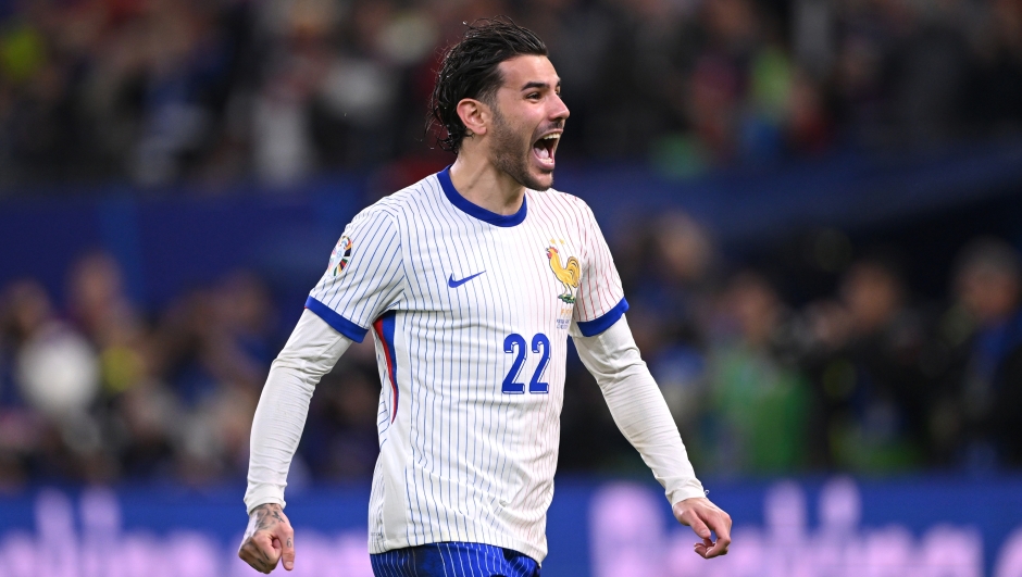  Theo Hernandez of France celebrates after scoring the winning penalty in the penalty shoot out during the UEFA EURO 2024 quarter-final match between Portugal and France at Volksparkstadion on July 05, 2024 in Hamburg, Germany. (Photo by Stu Forster/Getty Images)