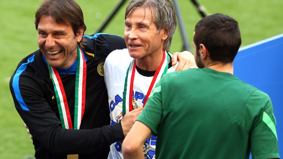 Inter Milan?s coach Antonio Conte (L9 and team manager Gabriele Oriali jubilate  at the end of the Italian serie A soccer match between FC Inter  and Udinese at Giuseppe Meazza stadium in Milan, 23 May 2021.
ANSA / MATTEO BAZZI