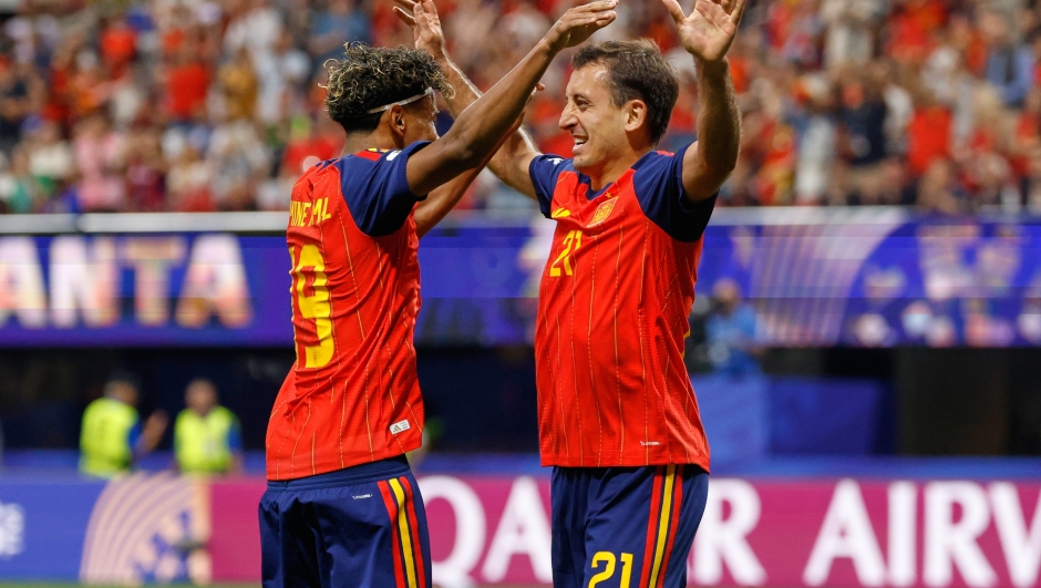 Spain's Mikel Oyarzabal celebrates with teammate Lamine Yamal, left, after scoring during the World Cup Group H soccer match between Spain and Saudi Arabia in Atlanta, Sunday, June 21, 2026. (AP Photo/Erik S.Lesser)