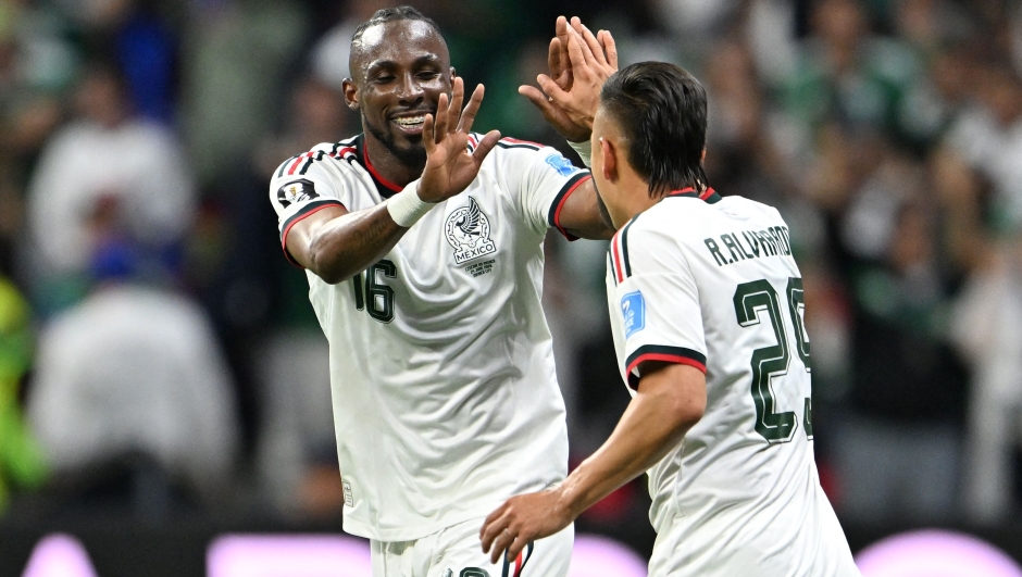 Mexico's forward #16 Julian Quinones celebrates scoring his team's second goal with teammate midfielder #25 Roberto Alvarado during the 2026 World Cup Group A football match between the Czech Republic and Mexico at the Mexico City Stadium in Mexico City on June 24, 2026.  (Photo by CARL DE SOUZA / AFP)