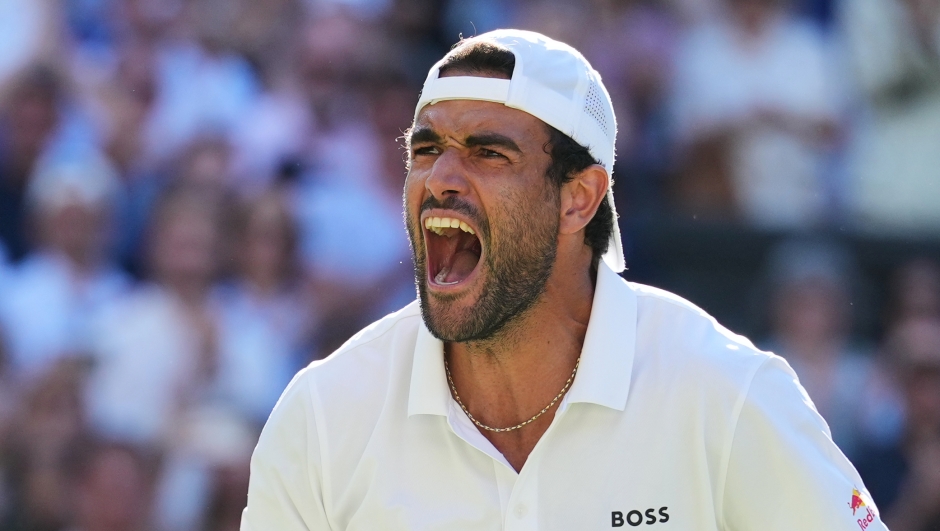 Matteo Berrettini of Italy celebrates winning the second round men's singles match against Arthur Fils of France at the Wimbledon Tennis Championships in London, Thursday, July 2, 2026.(AP Photo/Kirsty Wigglesworth)