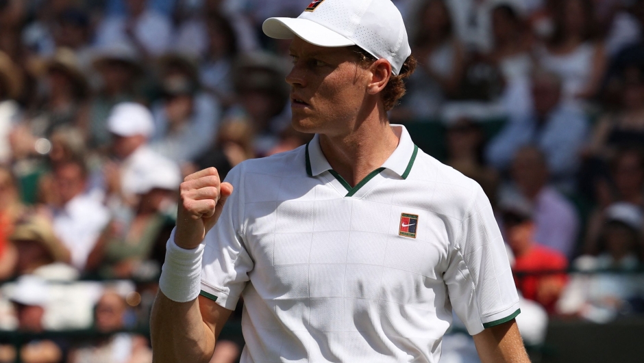 Italy's Jannik Sinner reacts against US player Jenson Brooksby during their men's singles third round tennis match on the fifth day of the 2026 Wimbledon Championships at The All England Lawn Tennis and Croquet Club in Wimbledon, southwest London, on July 3, 2026. (Photo by Adrian Dennis / AFP) / RESTRICTED TO EDITORIAL USE