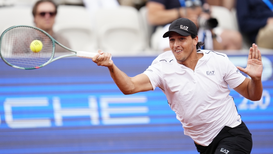 Italy's Luciano Darderi returns the ball to Russia's Andrey Rublev during the final match at the Nordea Open tennis tournament in Bastad, Sweden, Sunday, July 19, 2026. (Bjoern Larsson Rosvall/TT News Agency via AP)
