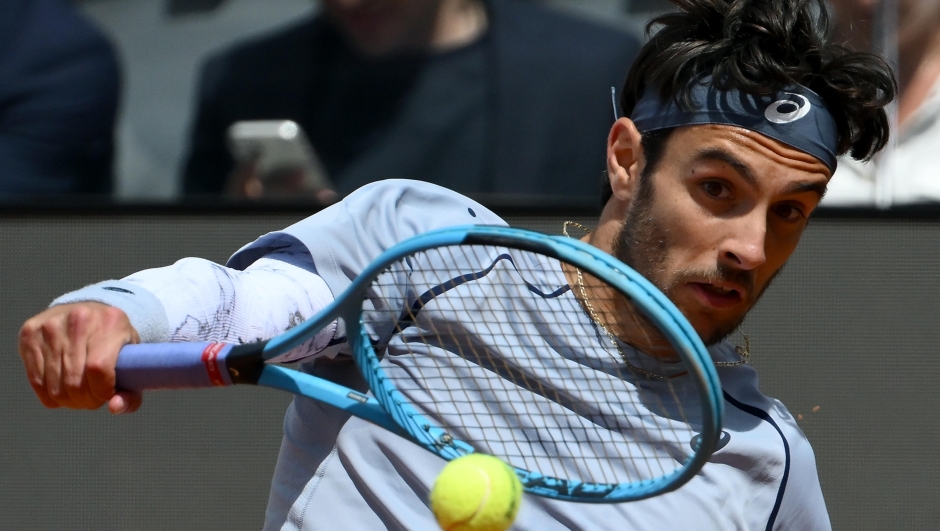 Lorenzo Musetti of Italy in action during his men's singles match against Casper Ruud of Norway (not pictured) at the Italian Open tennis tournament in Rome, Italy, 12 May 2026.  ANSA/ETTORE FERRARI