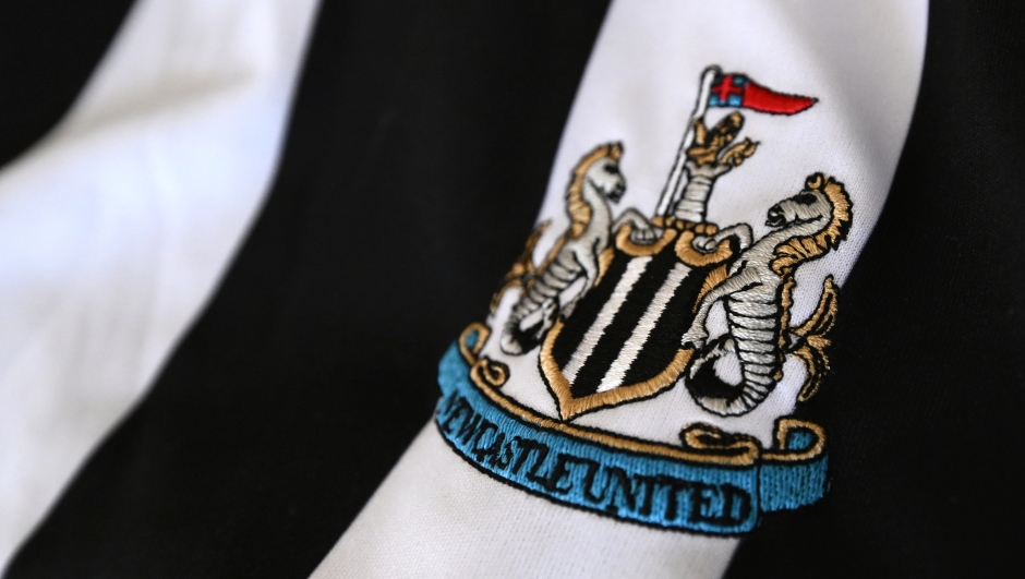  The present Newcastle United badge is pictured on a supporters shirt during the Premier League match between Newcastle United FC and Chelsea FC at St James' Park on May 11, 2025 in Newcastle upon Tyne, England. (Photo by Stu Forster/Getty Images)