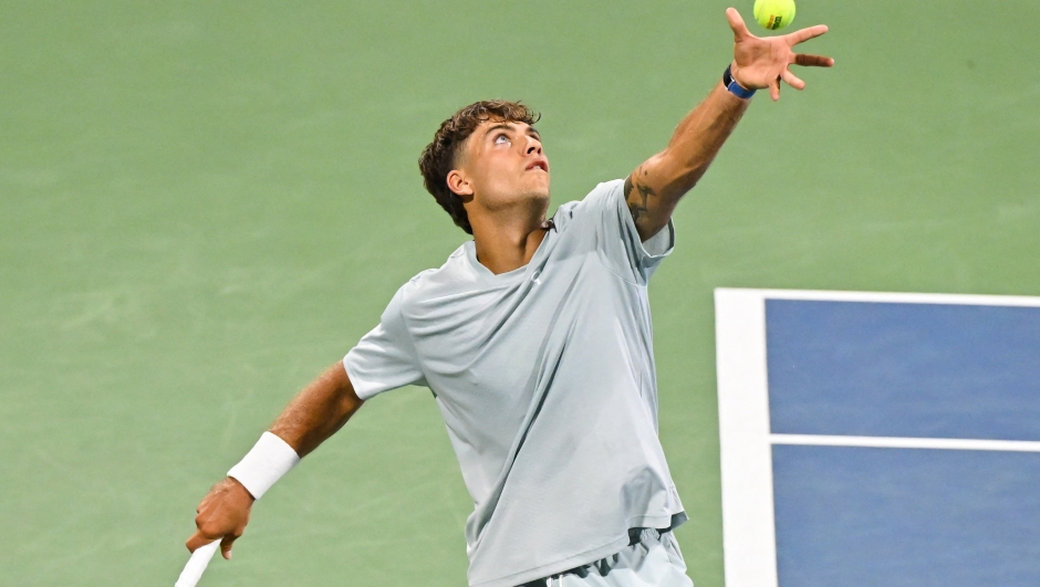  Flavio Cobolli of Italy serves against Yannick Hanfmann of Germany during their singles second round match on day three of the ATP 1000 National Bank Open presented by Rogers at Stade IGA on August 4, 2026 in Montreal, Quebec, Canada.   Minas Panagiotakis/Getty Images/AFP (Photo by Minas Panagiotakis / GETTY IMAGES NORTH AMERICA / Getty Images via AFP)