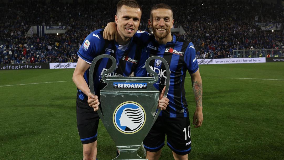 Иосип Иличич и Папу Гомес, символы Аталанты