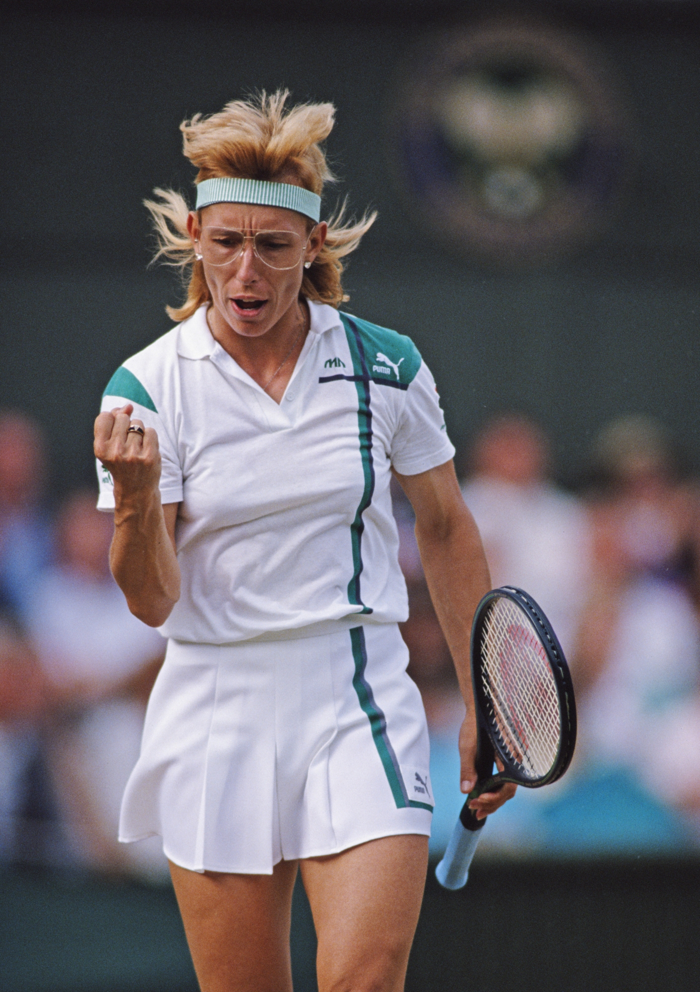 Martina Navratilova of the United States pumps her fist during her Women's Singles Final match against Steffi Graf at the Wimbledon Lawn Tennis Championship on 3 July 1988 at the All England Lawn Tennis and Croquet Club in Wimbledon in London, England. (Photo by Bob Martin/Getty Images)