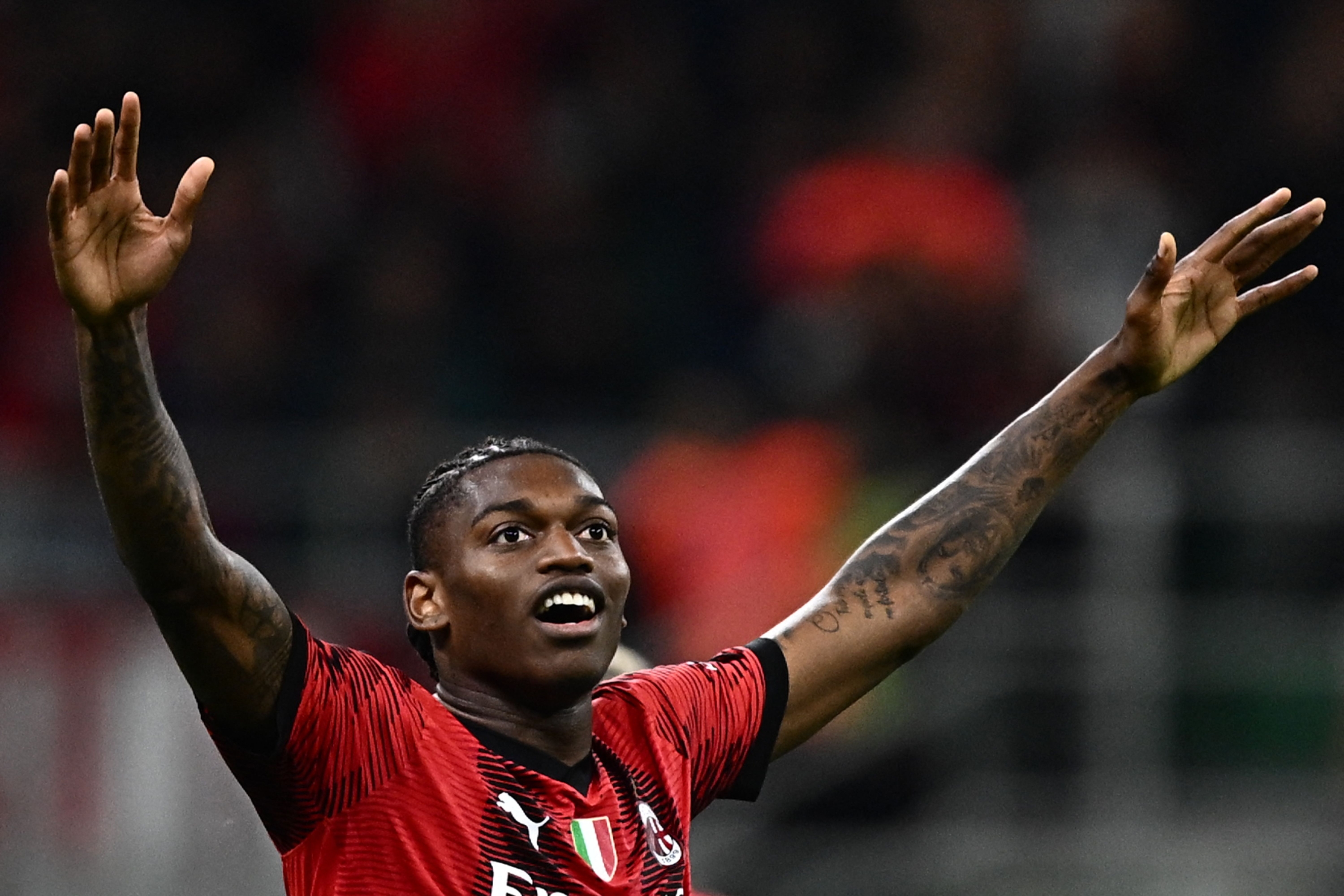 AC Milan's Portuguese forward Rafael Leao celebrates after scoring  during the Italian Serie A football match between AC Milan and Hellas Verona on June 4, 2023 at the San Siro stadium in Milan. (Photo by GABRIEL BOUYS / AFP)