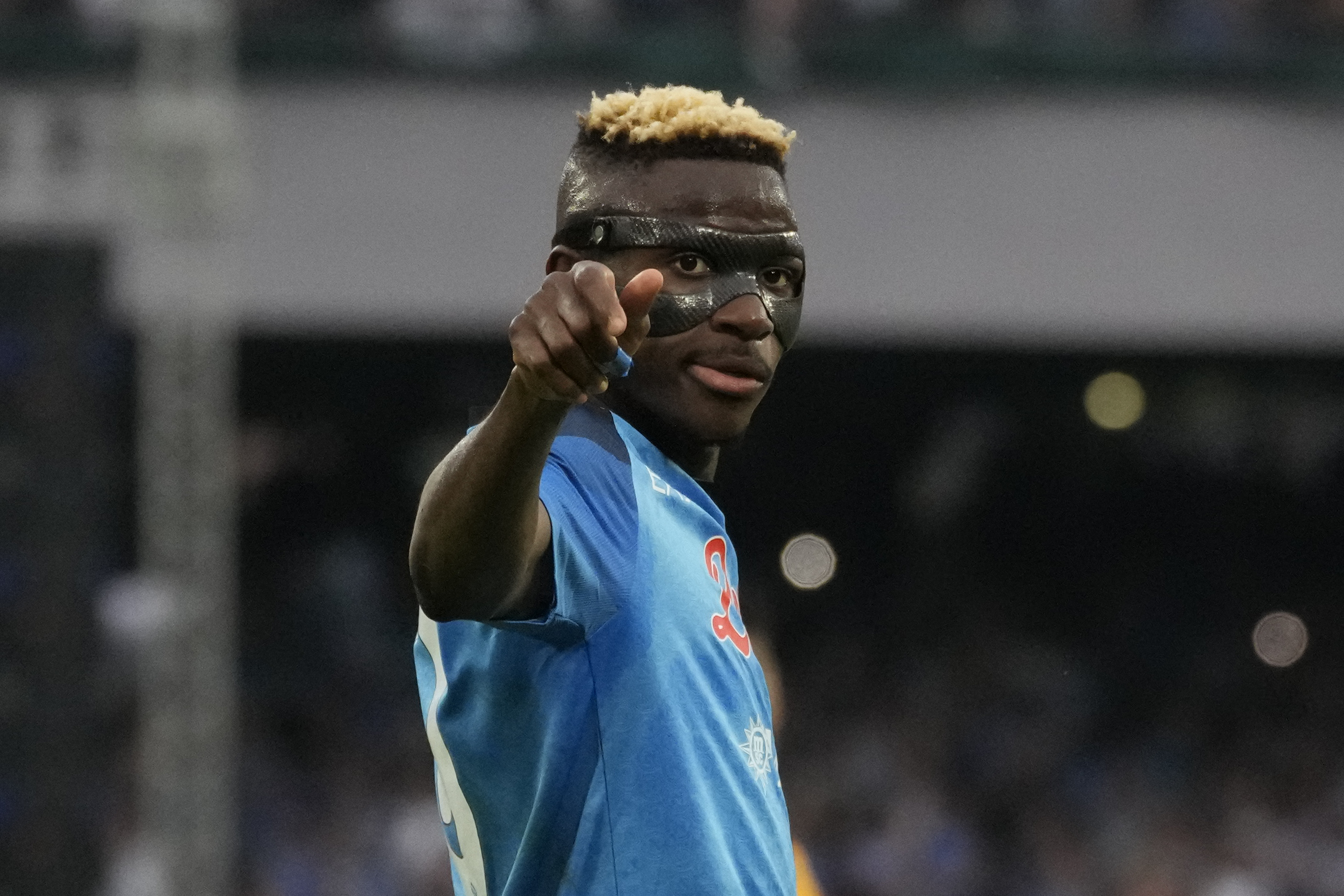 FILE - Napoli's Victor Osimhen celebrates after scoring during the Serie A soccer match between Napoli and Sampdoria at the Diego Maradona Stadium, in Naples, Sunday, June 4, 2023. (AP Photo/Andrew Medichini, File)