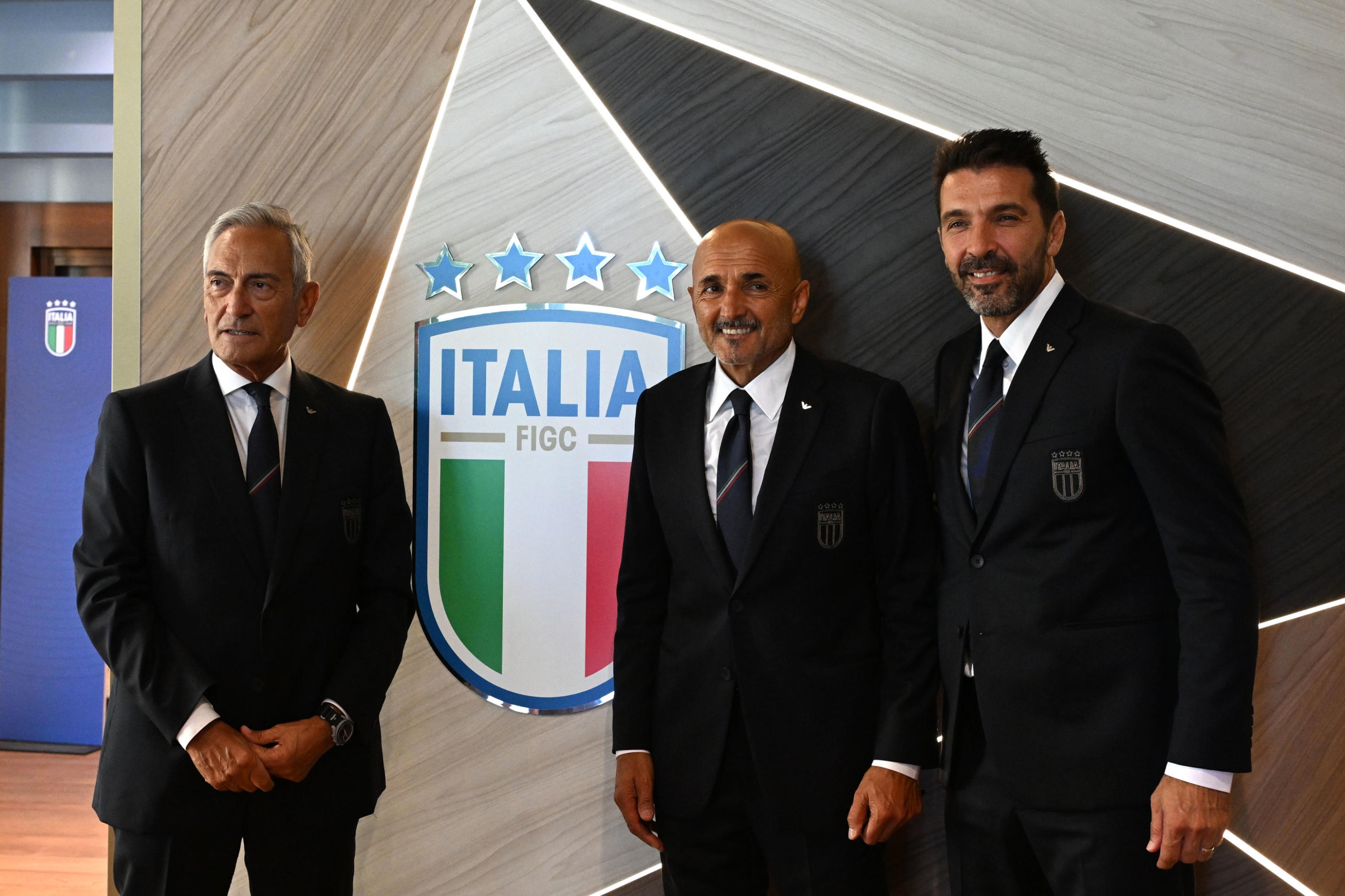 Italy's national soccer team head coach Luciano Spalletti (C) Italian national soccer FA President Gabriele Gravina (L) and Gianluigi Buffon (R) attends a press conference in Coverciano in Florence, Italy, 2 September 2023 ANSA/CLAUDIO GIOVANNINI