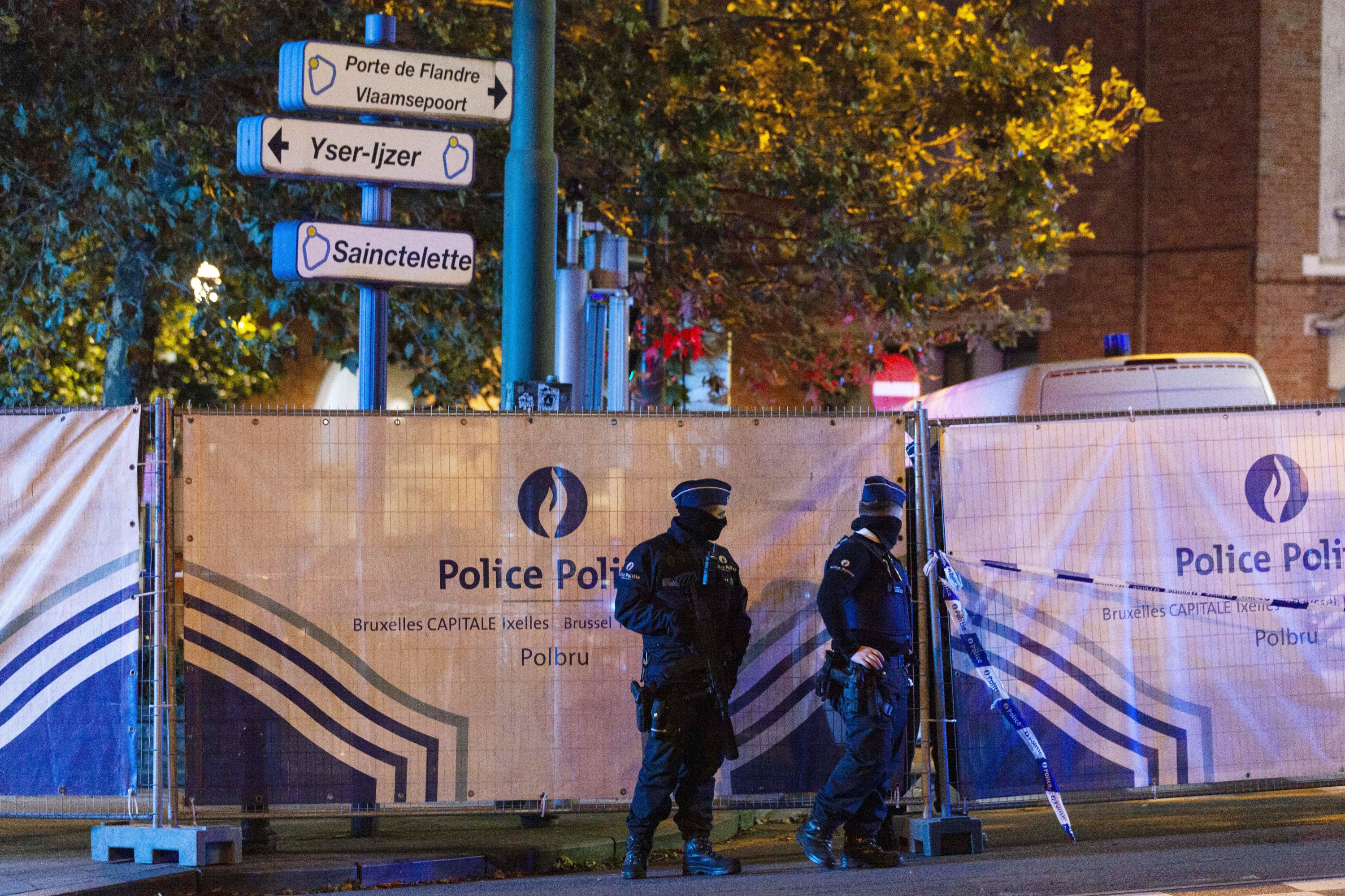 Police cordon off an area where a shooting took place in the center of Brussels, Monday, Oct. 16, 2023. Belgian police say that two people are dead in central Brussels after several shots were fired. (AP Photo/Nicolas Landemard)   Associated Press/LaPresse Only Italy and Spain
