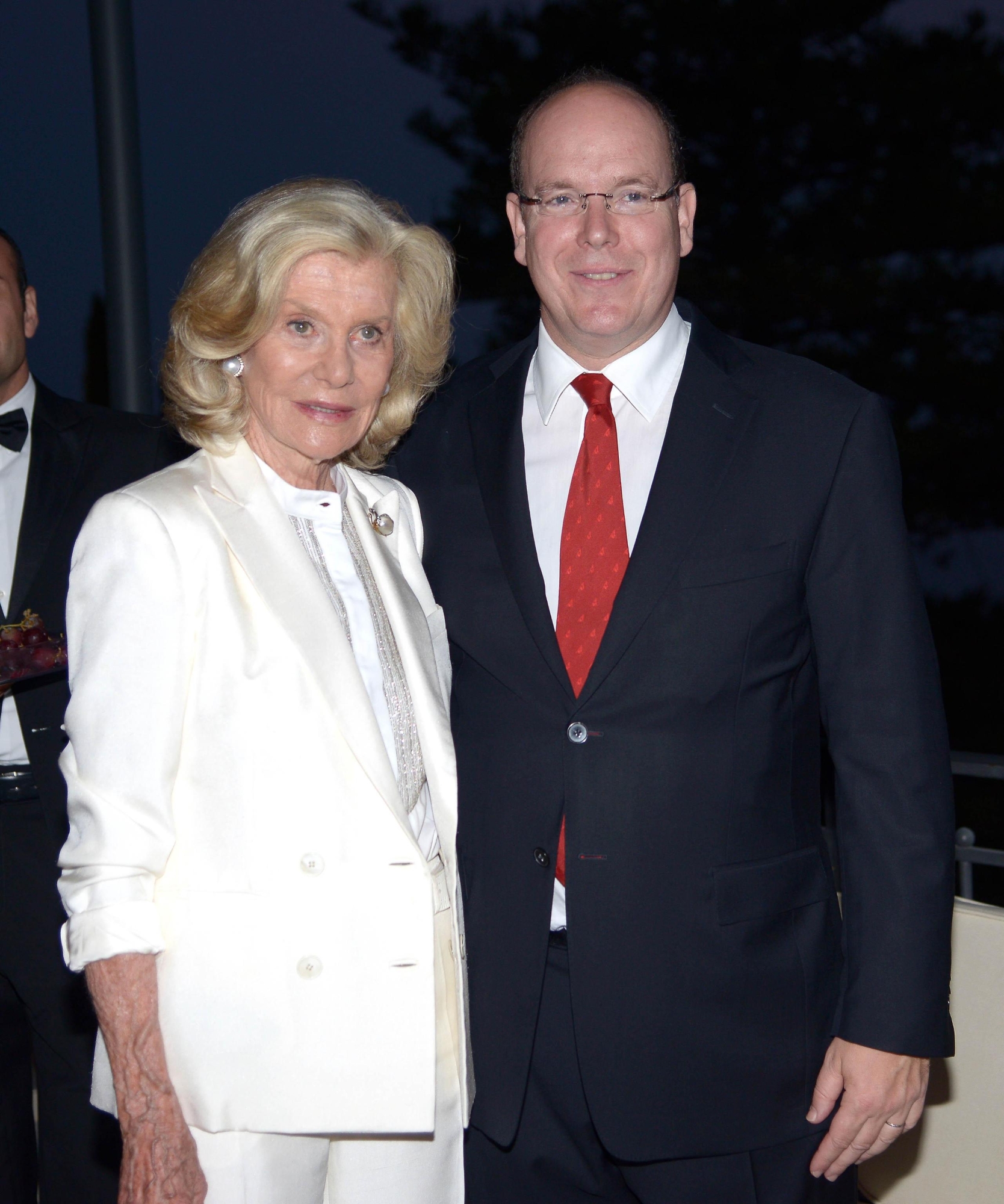 Prince Alberto II of Monaco poses with Marina Cicogna (R) during a party before the special evening dedicated to the "Fondation Prince Albert II of Monaco", worked for many years on the protection of the environment and promotion of sustainable development on a global scale, during the Taormina Film Festival, at the Teatro Antico, in Taormina, Sicily Island, Italy, late 16 June 2013.  ANSA/CLAUDIO ONORATI