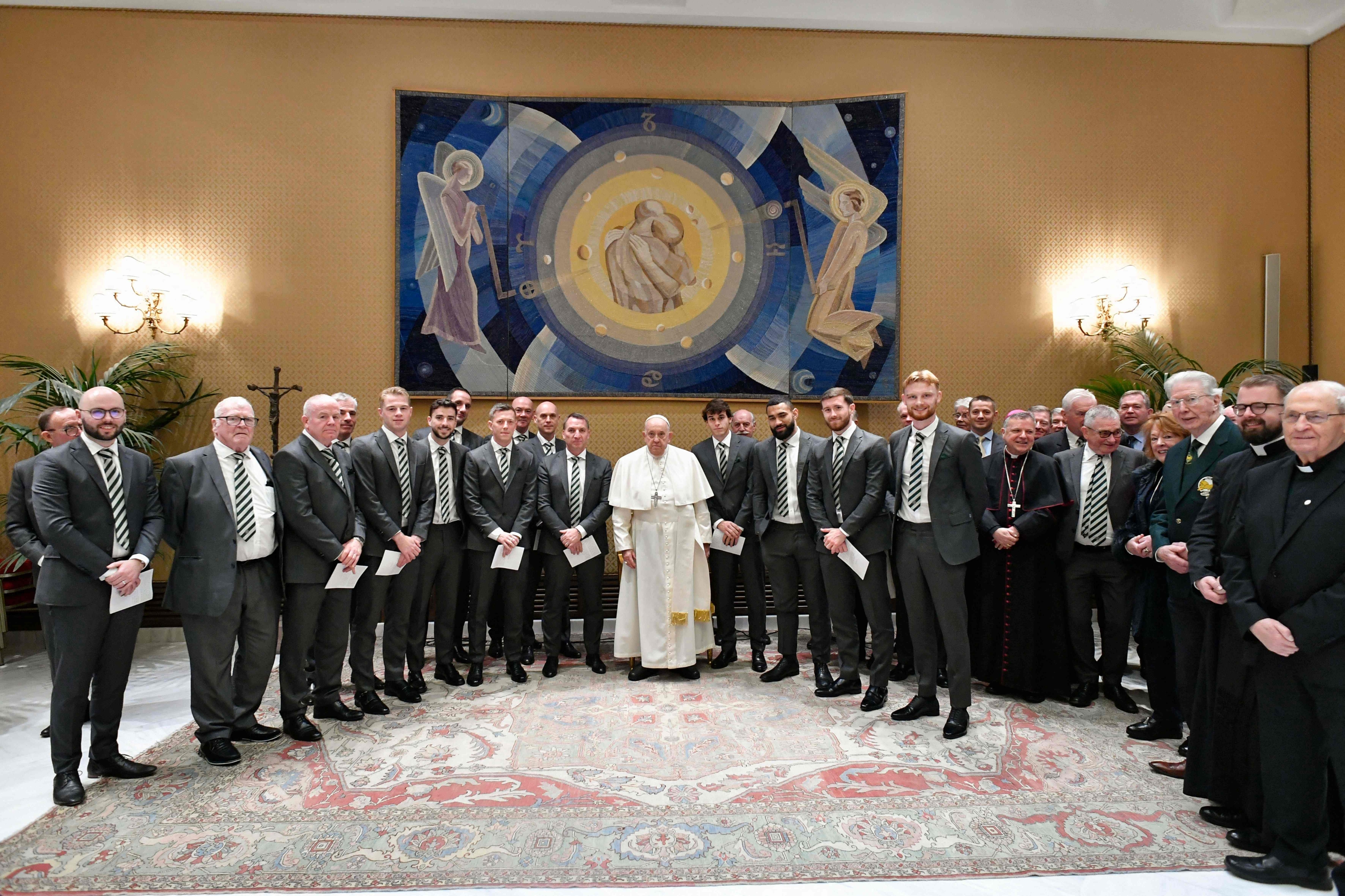 This photo taken and handout on November 29, 2023 by The Vatican Media shows Pope Francis during an audience with members of the Scottish football team Celtic Glasgow in The Vatican. (Photo by Handout / VATICAN MEDIA / AFP) / RESTRICTED TO EDITORIAL USE - MANDATORY CREDIT "AFP PHOTO / VATICAN MEDIA" - NO MARKETING - NO ADVERTISING CAMPAIGNS - DISTRIBUTED AS A SERVICE TO CLIENTS
