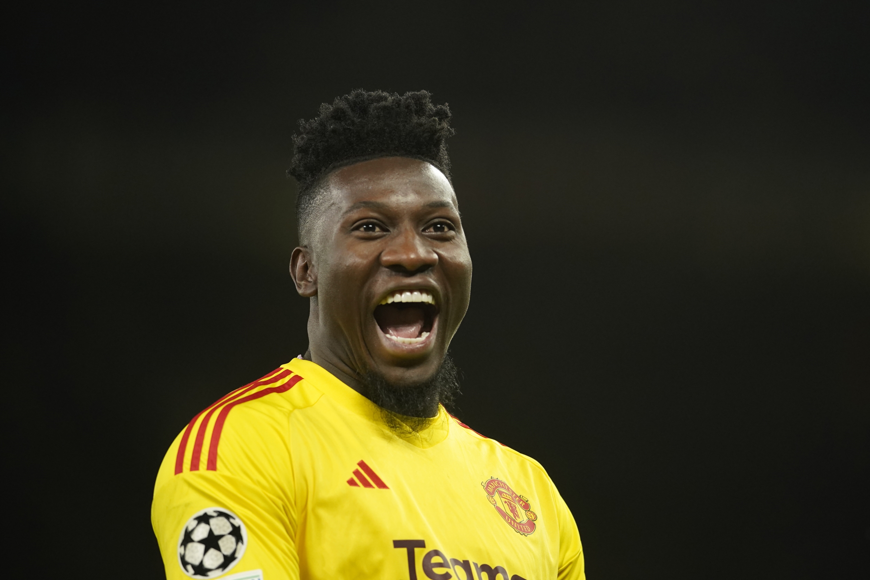 Manchester United's goalkeeper Andre Onana reacts during the Champions League group A soccer match between Manchester United and Galatasaray at the Old Trafford stadium in Manchester, England, Tuesday, Oct. 3, 2023. (AP Photo/Dave Thompson)