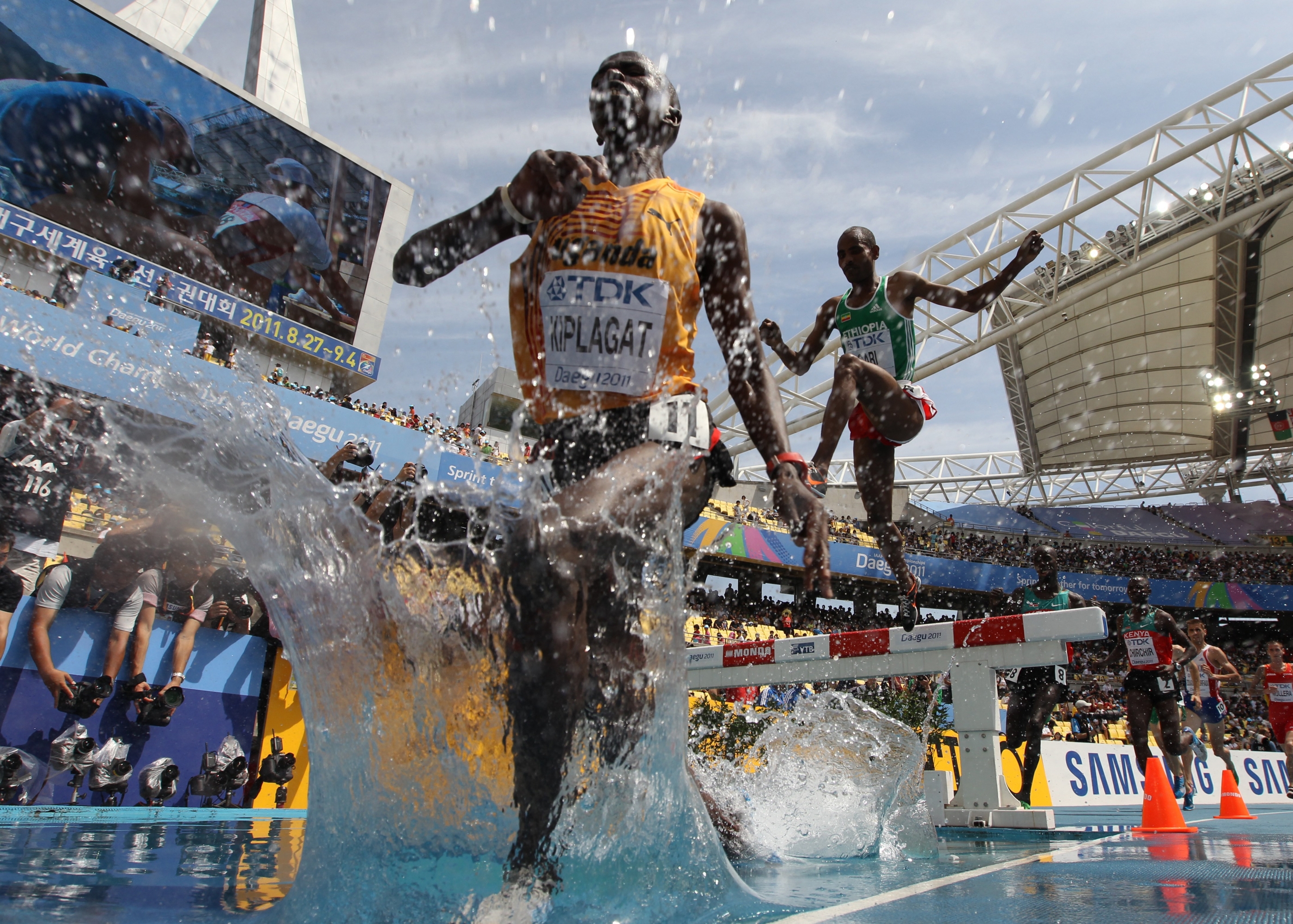 Uganda's Benjamin Kiplagat competes in the men's 3,000 metres steeplechase heats at the International Association of Athletics Federations (IAAF) World Championships in Daegu on August 29, 2011.  AFP PHOTO / ADRIAN DENNIS (Photo by ADRIAN DENNIS / AFP)