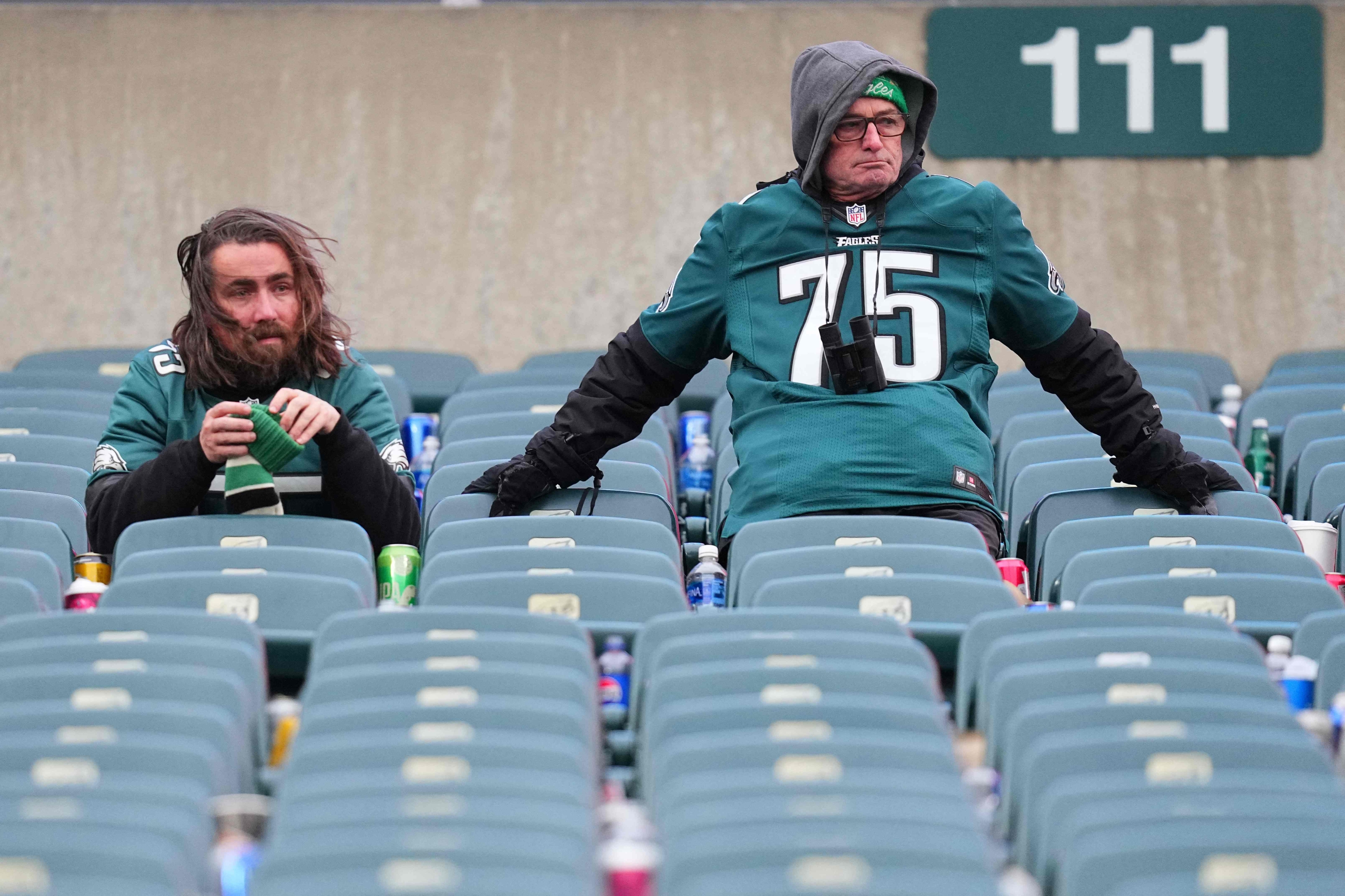 PHILADELPHIA, PENNSYLVANIA - DECEMBER 31: Philadelphia Eagles fans look on after the game against the Arizona Cardinals at Lincoln Financial Field on December 31, 2023 in Philadelphia, Pennsylvania.   Mitchell Leff/Getty Images/AFP (Photo by Mitchell Leff / GETTY IMAGES NORTH AMERICA / Getty Images via AFP)