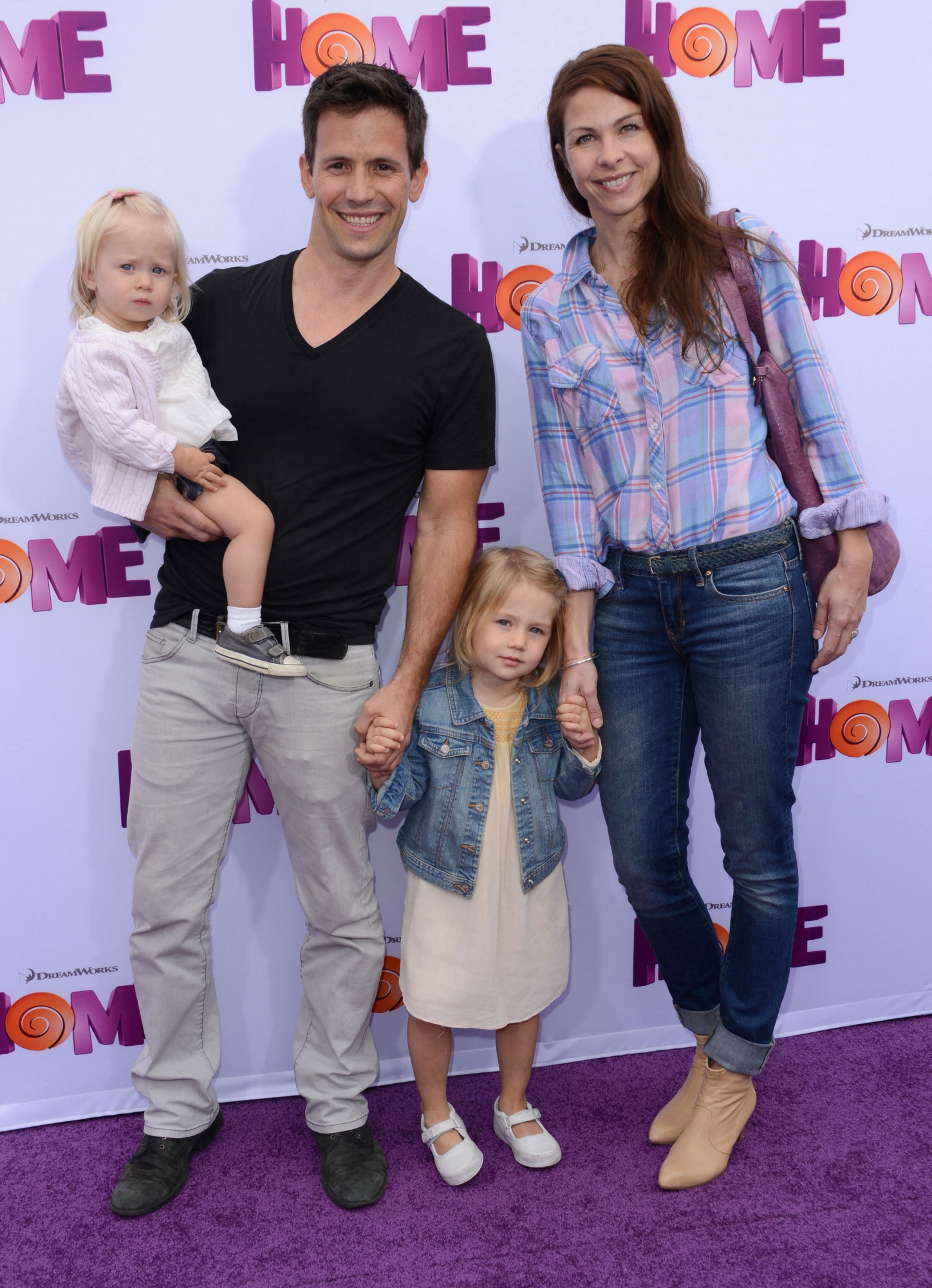 Actor Christian Oliver with his family arrives for the premiere of 'Home' at the Regency Village theatre in Westwood, California, March 22, 2015. German-born Hollywood actor Christian Oliver was killed along with his two young daughters as their small plane plummeted into the Caribbean Sea moments after takeoff, local police said January 5, 2024. (Photo by Chris DELMAS / AFP)