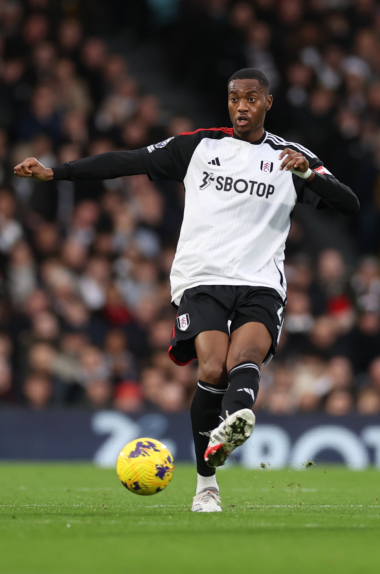 LONDON, ENGLAND - DECEMBER 23: Tosin Adarabioyo of Fulham controls the ball during the Premier League match between Fulham FC and Burnley FC at Craven Cottage on December 23, 2023 in London, England. (Photo by Ryan Pierse/Getty Images)
