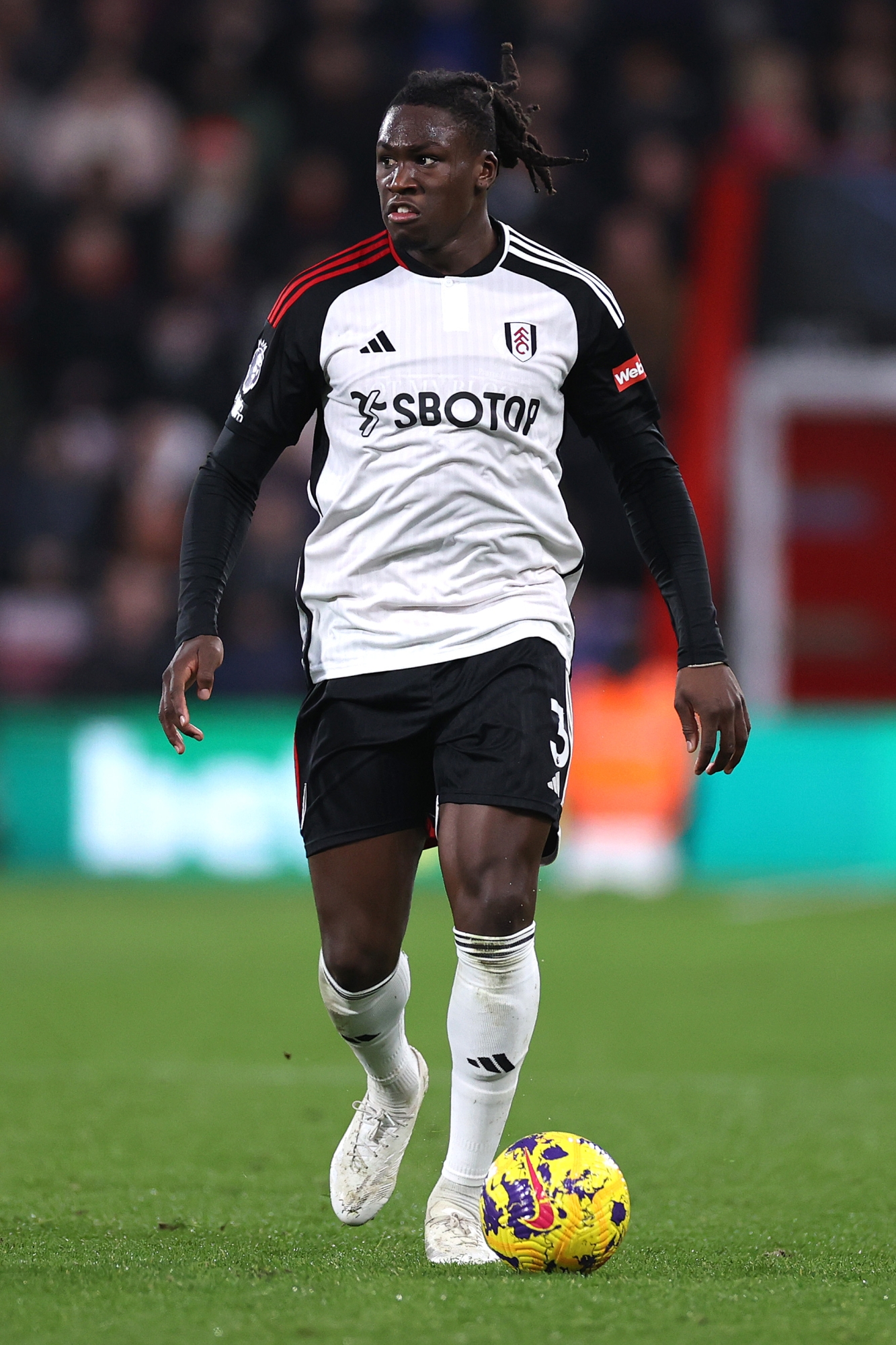 BOURNEMOUTH, ENGLAND - DECEMBER 26: Calvin Bassey of Fulham controls the ball during the Premier League match between AFC Bournemouth and Fulham FC at Vitality Stadium on December 26, 2023 in Bournemouth, England. (Photo by Ryan Pierse/Getty Images)