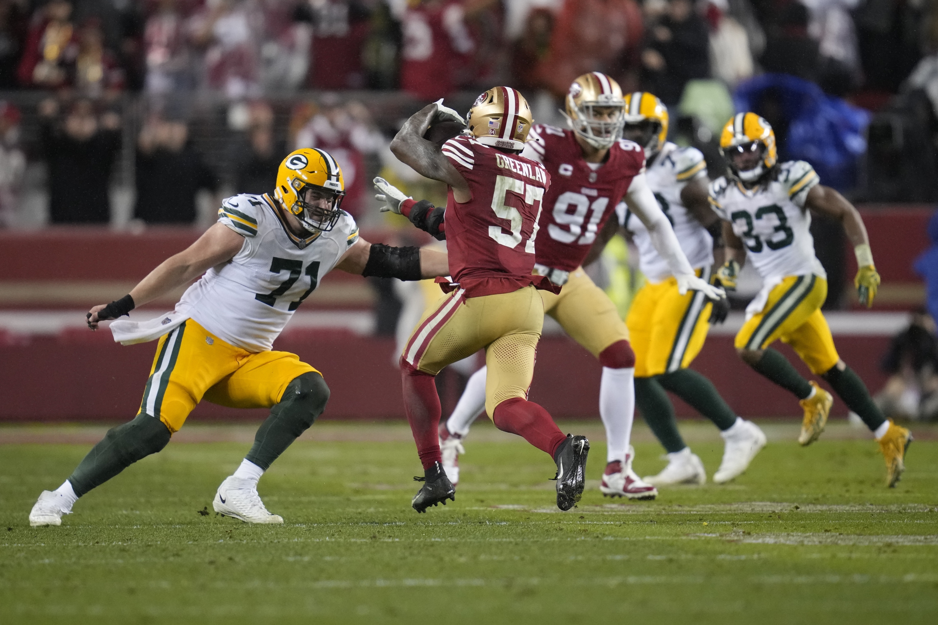 San Francisco 49ers linebacker Dre Greenlaw (57) intercepts a pass during the second half of an NFL football NFC divisional playoff game against the Green Bay Packers, Saturday, Jan. 20, 2024, in Santa Clara, Calif. (AP Photo/Ashley Landis)