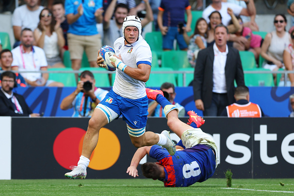 SAINT-ETIENNE, FRANCE - SEPTEMBER 09: Manuel Zuliani of Italy breaks away to score his side's sixth try during the Rugby World Cup France 2023 match between Italy and Namibia at Stade Geoffroy-Guichard on September 09, 2023 in Saint-Etienne, France. (Photo by Phil Walter/Getty Images)