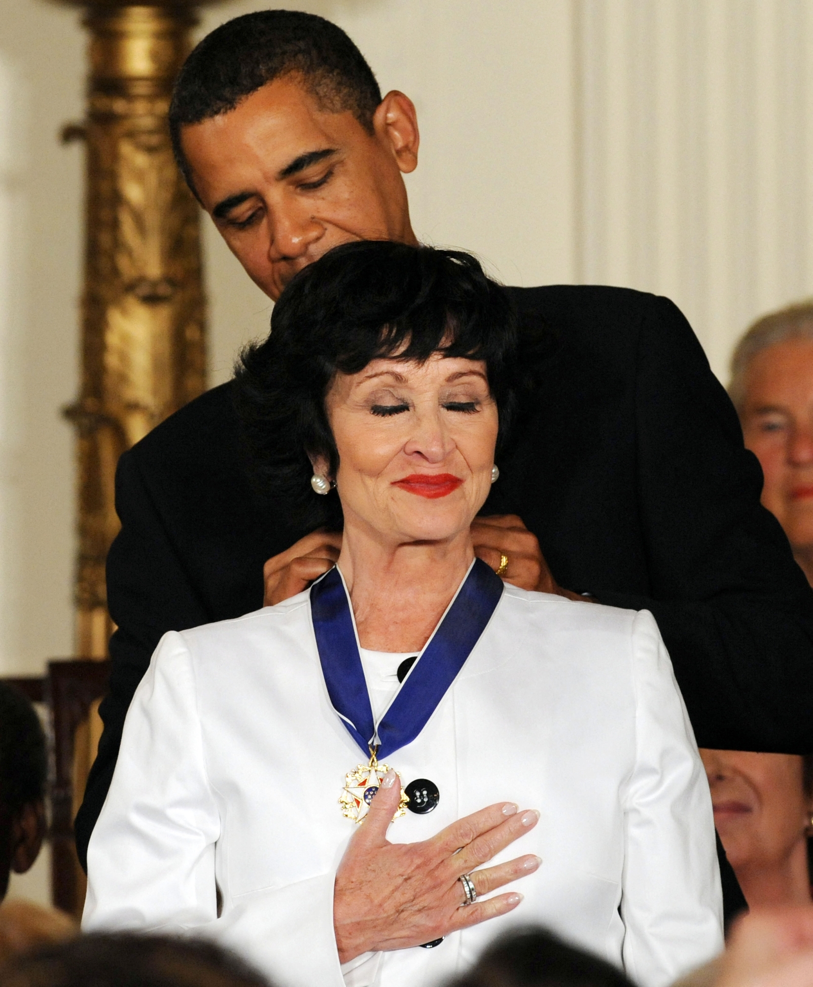 (FILES) US President Barack Obama presents the Presidential Medal of Freedom to actress, singer and dancer Chita Rivera during a ceremony in the East Room at the White House on August 12, 2009. Chita Rivera -- a singer, dancer and actress who lit up Broadway stages over six decades in such shows as "West Side Story" and "Chicago" as one of the foremost entertainers of her generation -- died at the age of 91 on January 30, 2024, her publicist said. (Photo by JEWEL SAMAD / AFP)
