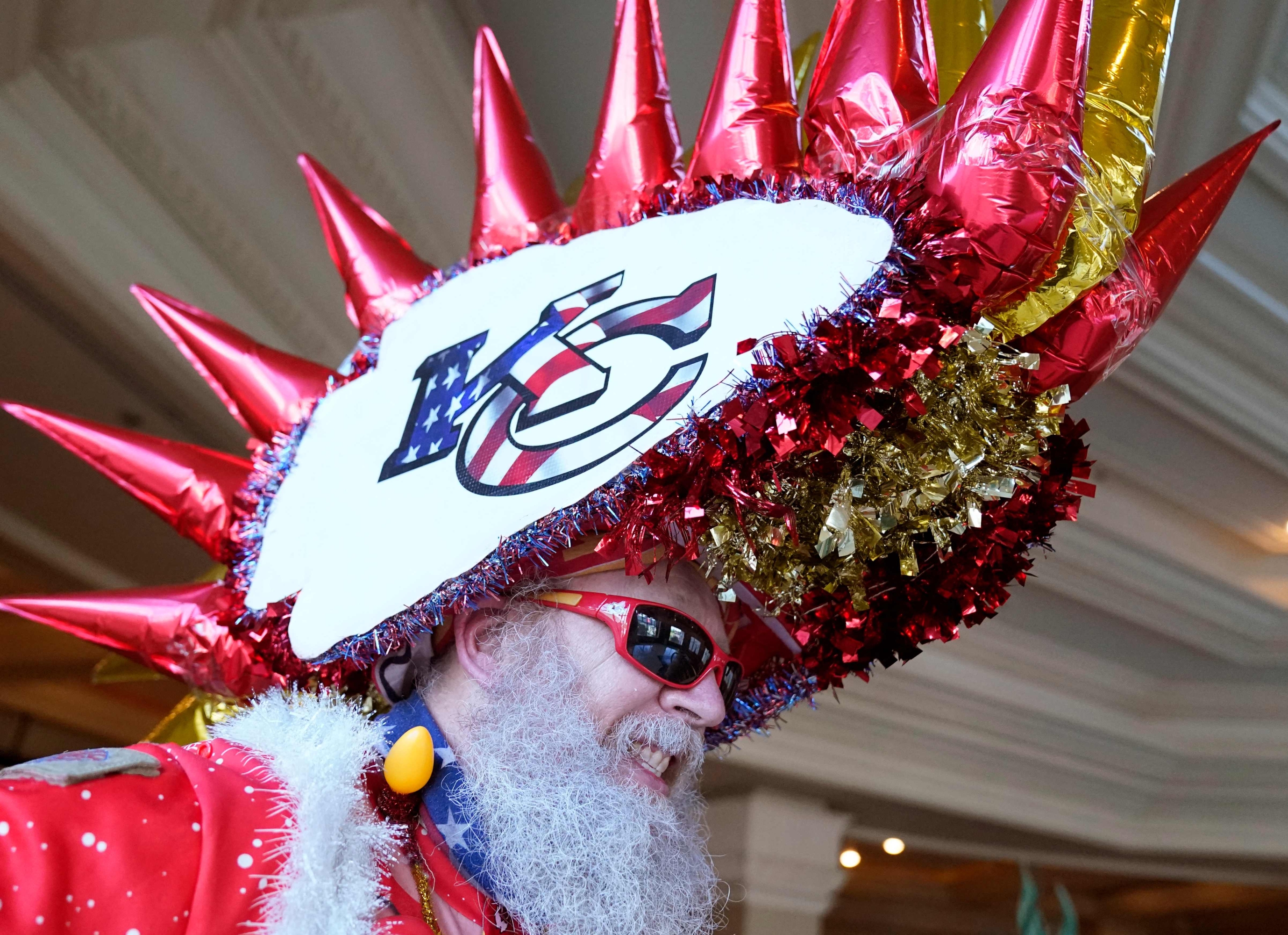 Kansas City Chiefs fan Don Lobmeyer, of Wichita, Kansas poses for pictures  ahead of Super Bowl LVIII at Allegiant Stadium in Las Vegas, Nevada on February 9, 2024. (Photo by TIMOTHY A. CLARY / AFP)
