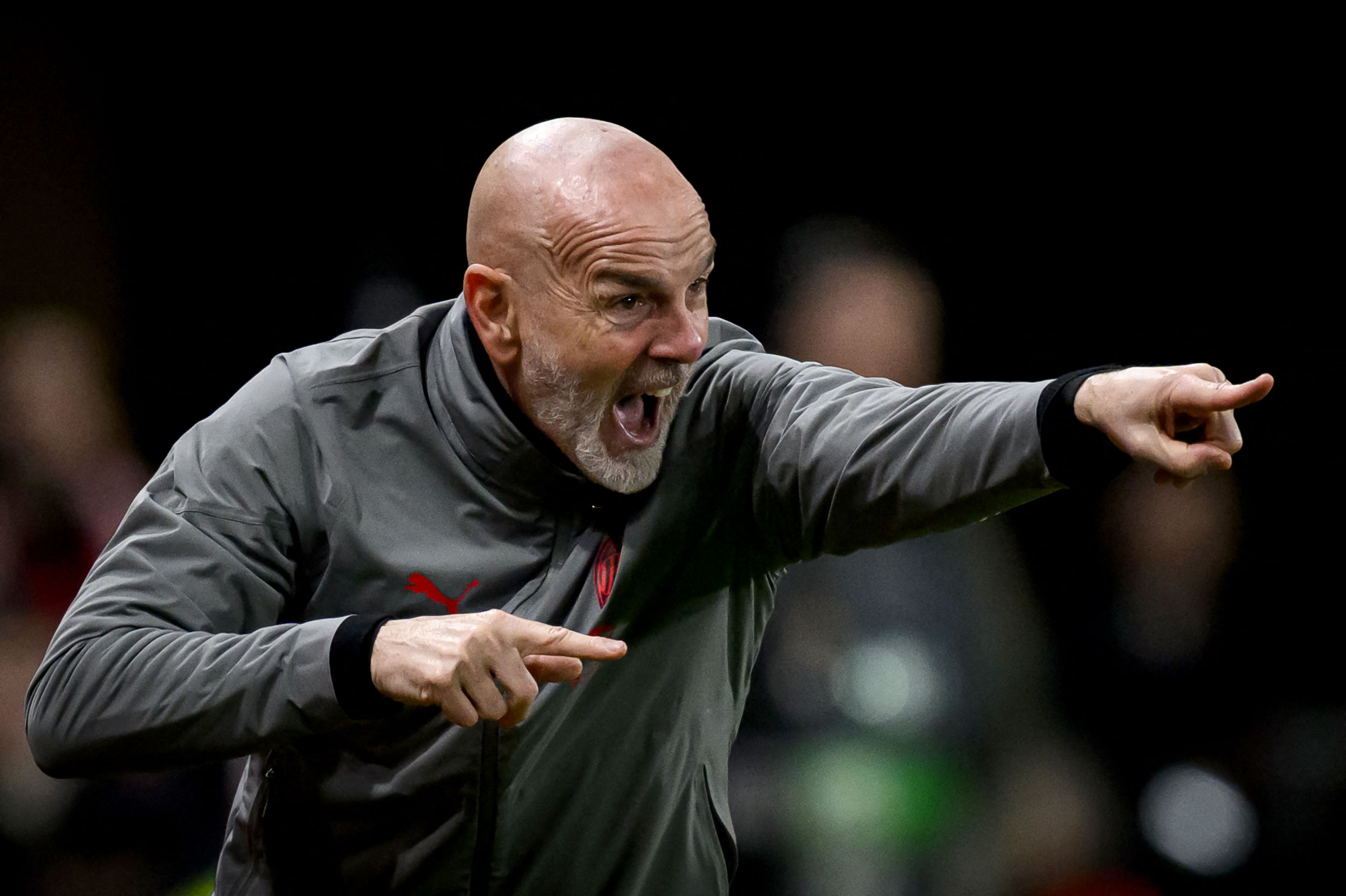 AC Milan's Italian coach Stefano Pioli shouts instructions to his players from the touchline during the UEFA Europa League round of 16 play-off match between Rennes and AC Milan at The Roazhon Park Stadium in Rennes, western France, on Febrtuary 22, 2024. (Photo by LOIC VENANCE / AFP)