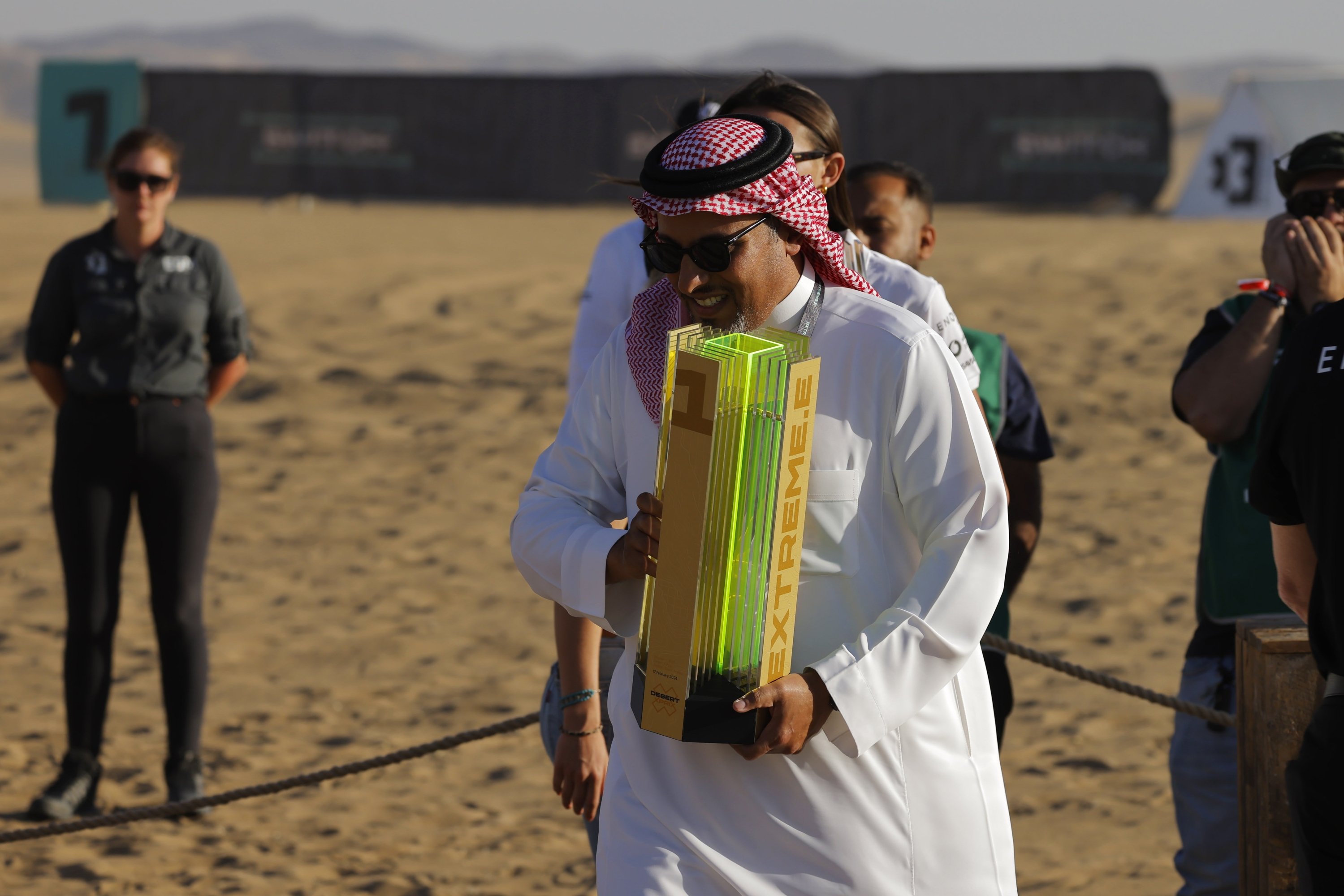 FEBRUARY 17: A local dignitary presents the 1st position trophy during the Saudi Arabia on February 17, 2024. (Photo by Andrew Ferraro / LAT Images)