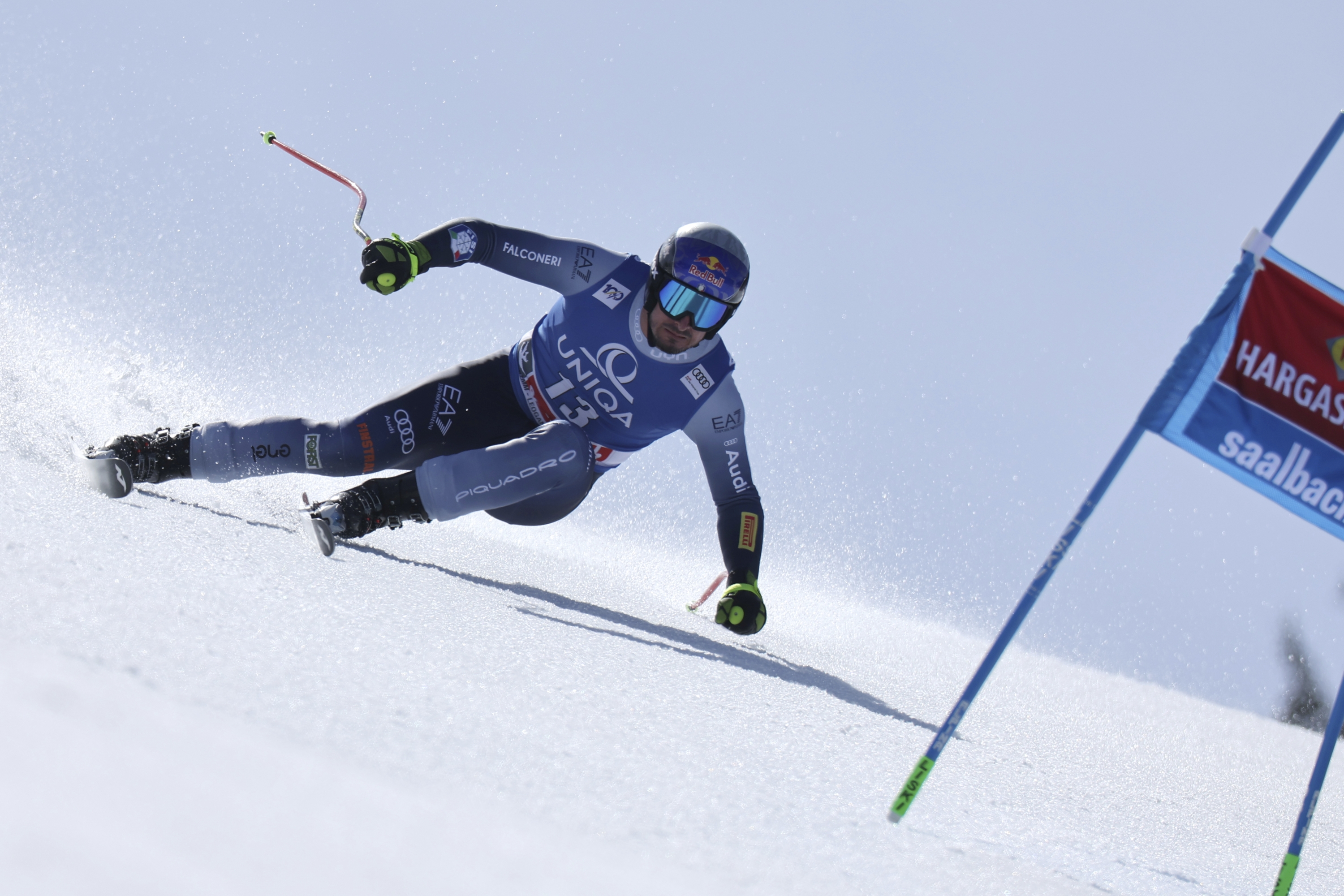Italy's Dominik Paris speeds down the course during an alpine ski, men's World Cup super-G race, in Saalbach, Austria, Friday, March 22, 2024. (AP Photo/Marco Trovati)