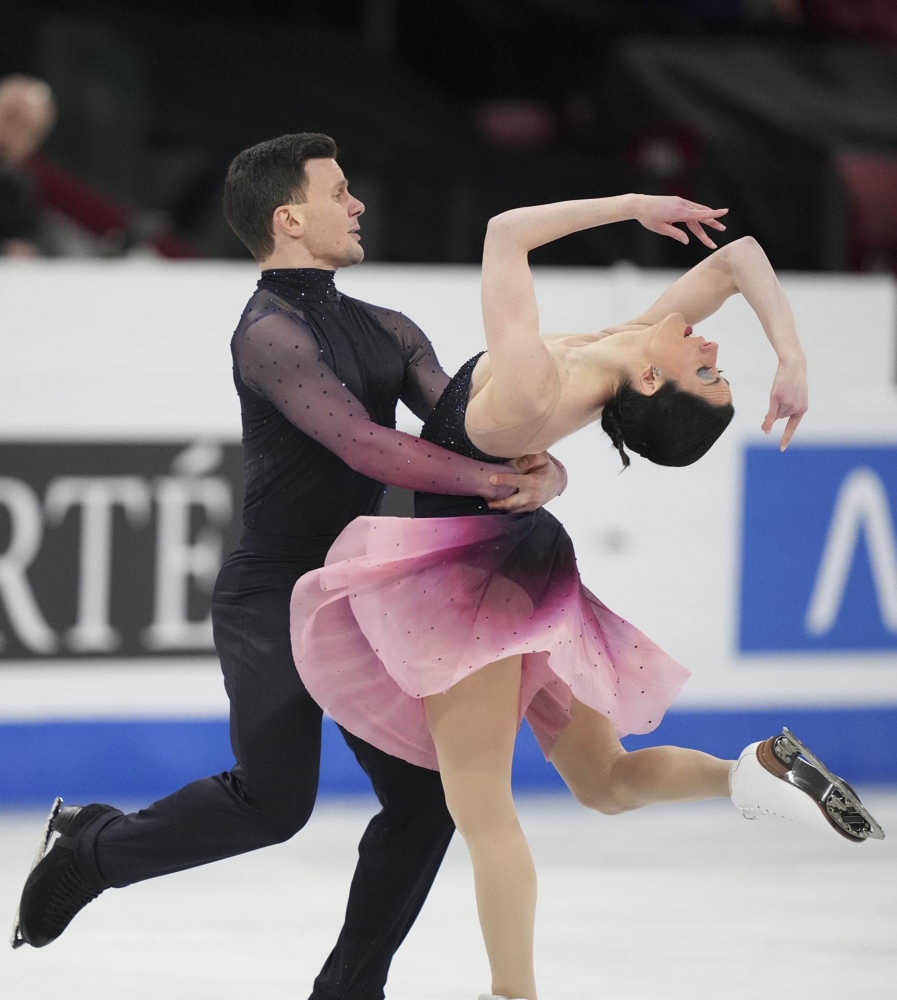 Charlene Guignard and Marco Fabbri, of Italy, perform their free dance in the ice dance competition at the figure skating world championships in Montreal, Saturday, March 23, 2024. (Christinne Muschi/The Canadian Press via AP)