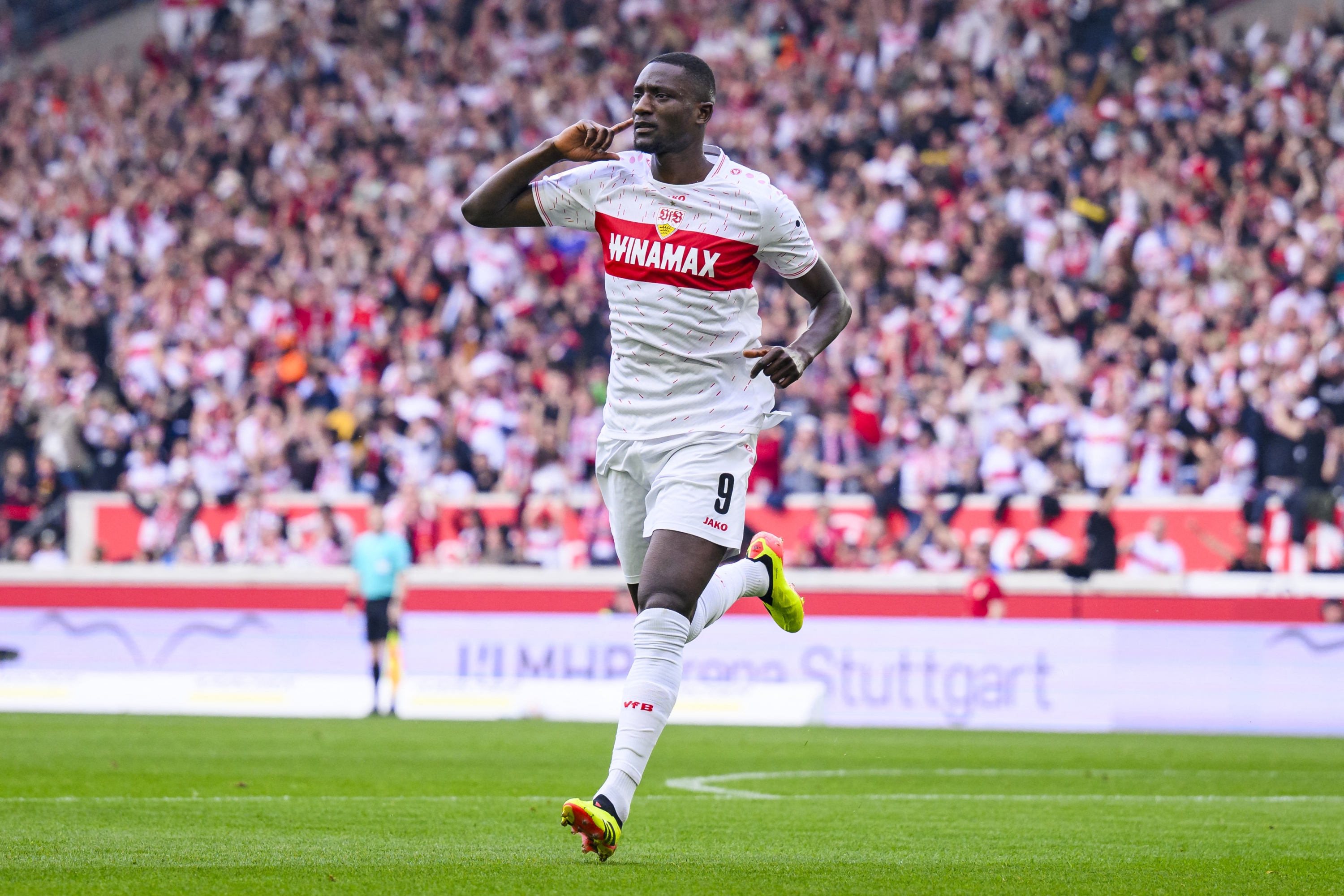 31 March 2024, Baden-W¸rttemberg, Stuttgart: Soccer: Bundesliga, VfB Stuttgart - 1. FC Heidenheim, Matchday 27, MHPArena. Stuttgart's Serhou Guirassy celebrates after scoring a goal. Photo: Tom Weller/dpa - IMPORTANT NOTE: In accordance with the regulations of the DFL German Football League and the DFB German Football Association, it is prohibited to utilize or have utilized photographs taken in the stadium and/or of the match in the form of sequential images and/or video-like photo series. (Photo by Tom Weller / DPA / dpa Picture-Alliance via AFP)