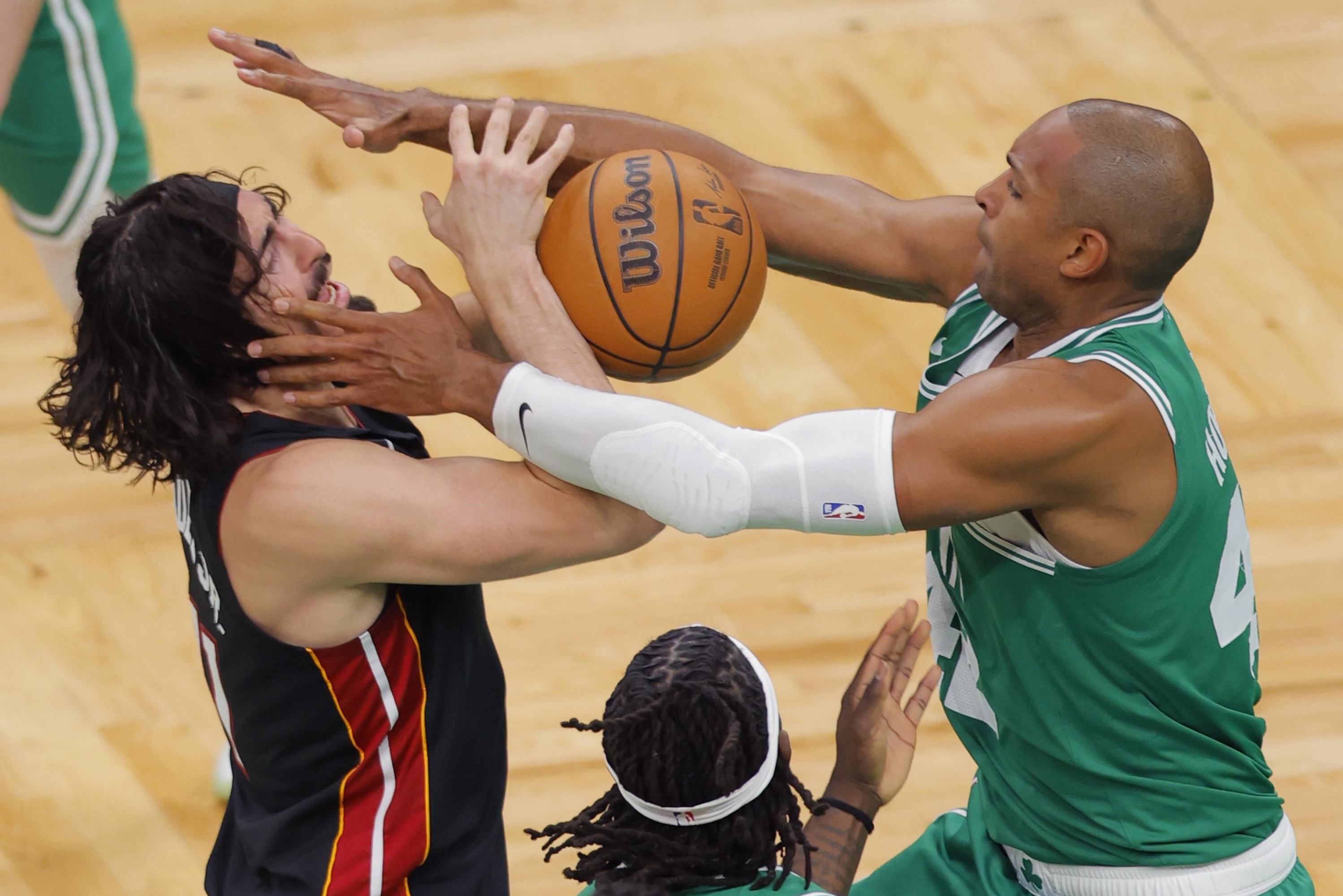 epaselect epa11298962 Miami Heat guard Jaime Jaquez Jr. (L) and Boston Celtics center Al Horford (R) in action during the first half of the NBA Eastern Conference first round playoff game two between the Miami Heat and the Boston Celtics in Boston, Massachusetts, USA, 24 April 2024. The Boston Celtics lead the best of seven series 1-0.  EPA/CJ GUNTHER SHUTTERSTOCK OUT