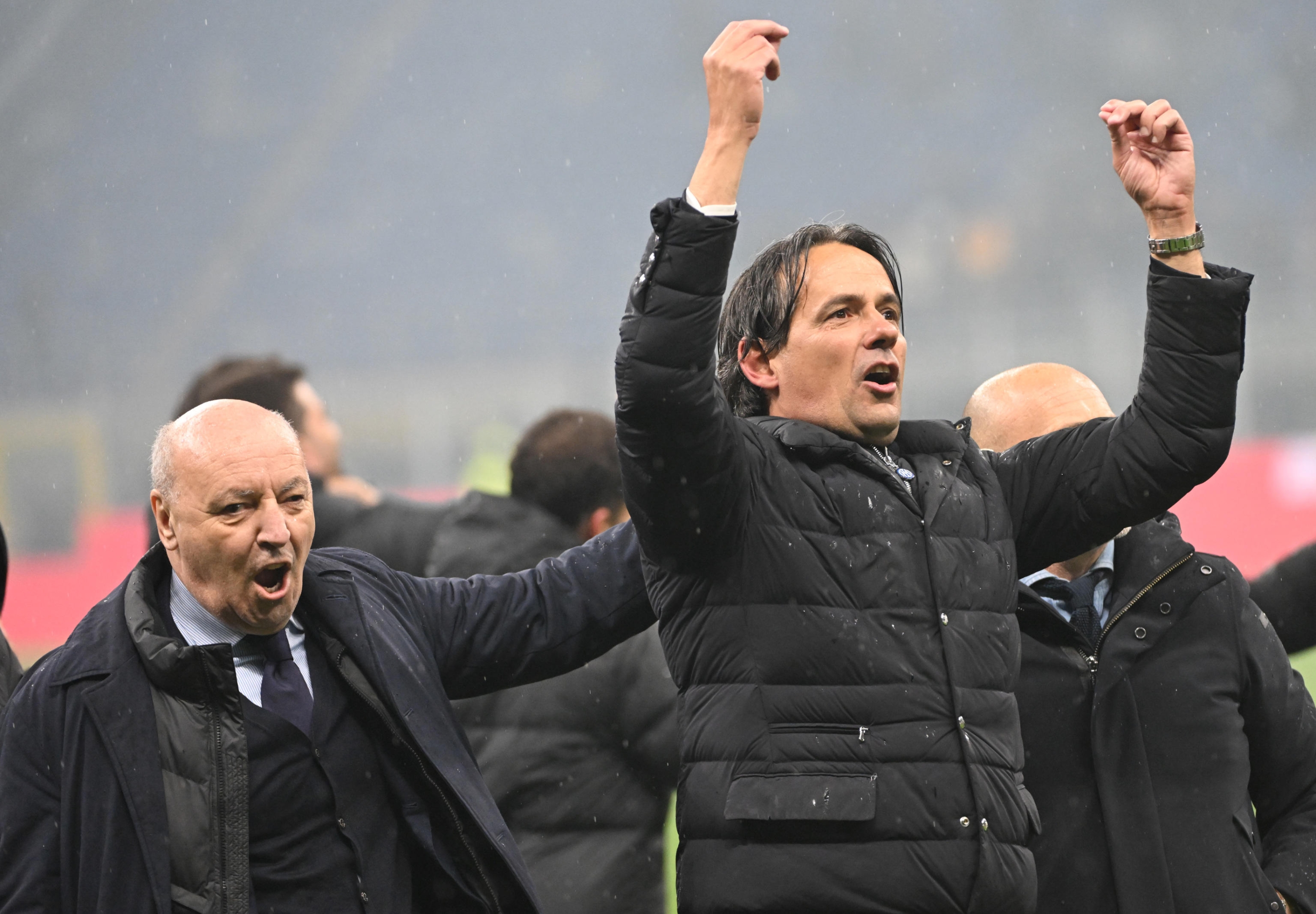 Inter's coach Simone Inzaghi (R) and CEO Giuseppe Marotta celebrate at the end of the Italian Serie A soccer match between Ac Milan and Inter Milan at the Giuseppe Meazza stadium in Milan, Italy, 22 April 2024. ANSA/DANIEL DAL ZENNARO