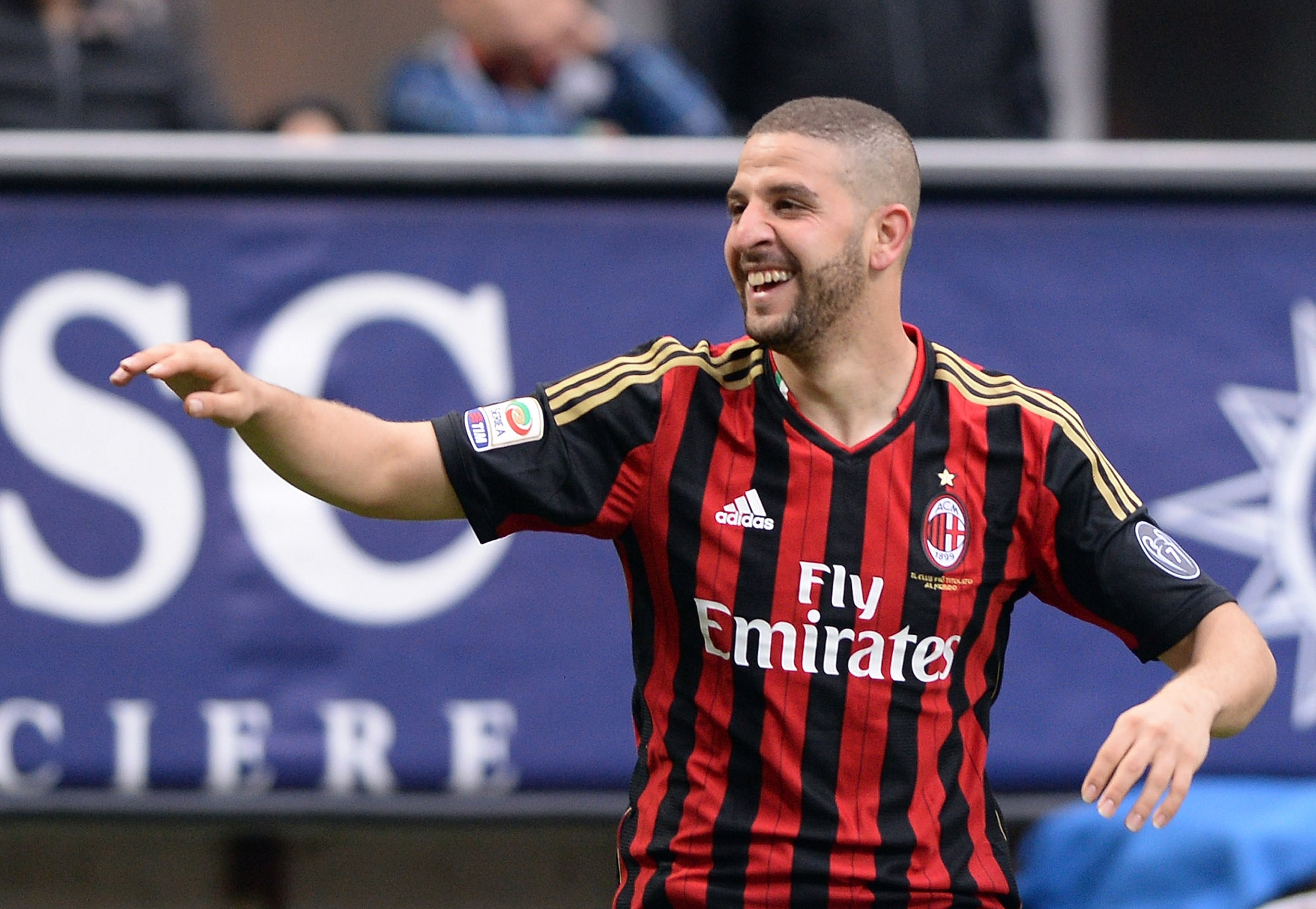 MILAN, ITALY - APRIL 19:  Adel Taarabt of AC Milan (R) celebrates scoring the second goal during the Serie A match between AC Milan and AS Livorno Calcio at San Siro Stadium on April 19, 2014 in Milan, Italy.  (Photo by Claudio Villa/Getty Images)