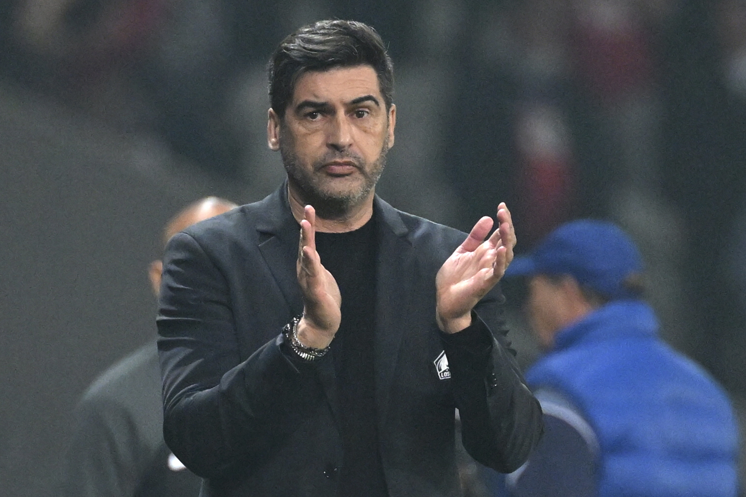Lille's head coach Paulo Fonseca reacts during the French League One soccer match between Lille and Marseille at the Pierre Mauroy stadium in Villeneuve d'Ascq, northern France, Friday, April 5, 2024. (AP Photo/Matthieu Mirville)