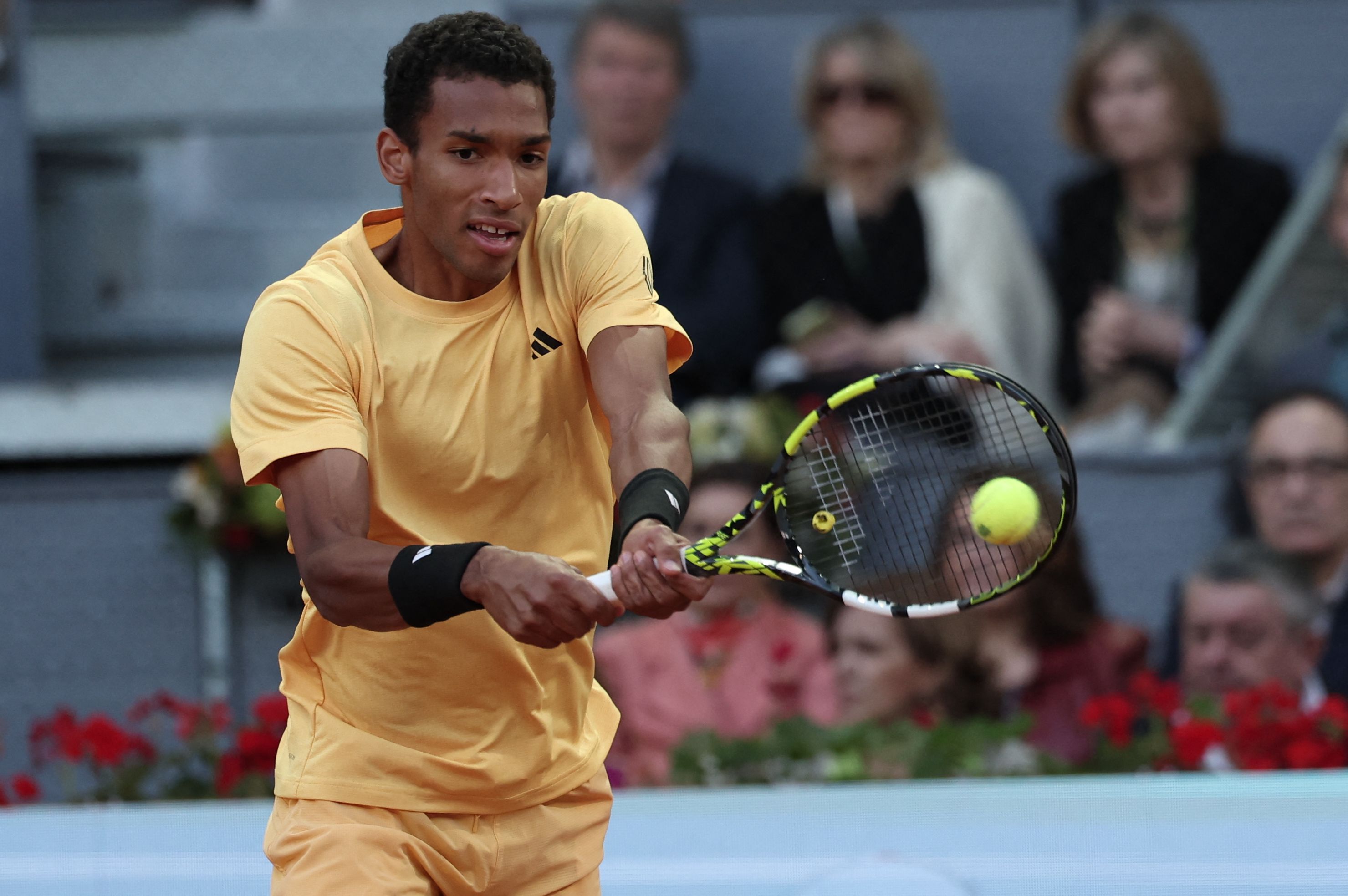 Canada's Felix Auger Aliassime returns the ball against Czech Republic's Jiri Lehecka during the 2024 ATP Tour Madrid Open tournament semifinal tennis match at Caja Magica in Madrid on May 3, 2024. (Photo by Thomas COEX / AFP)