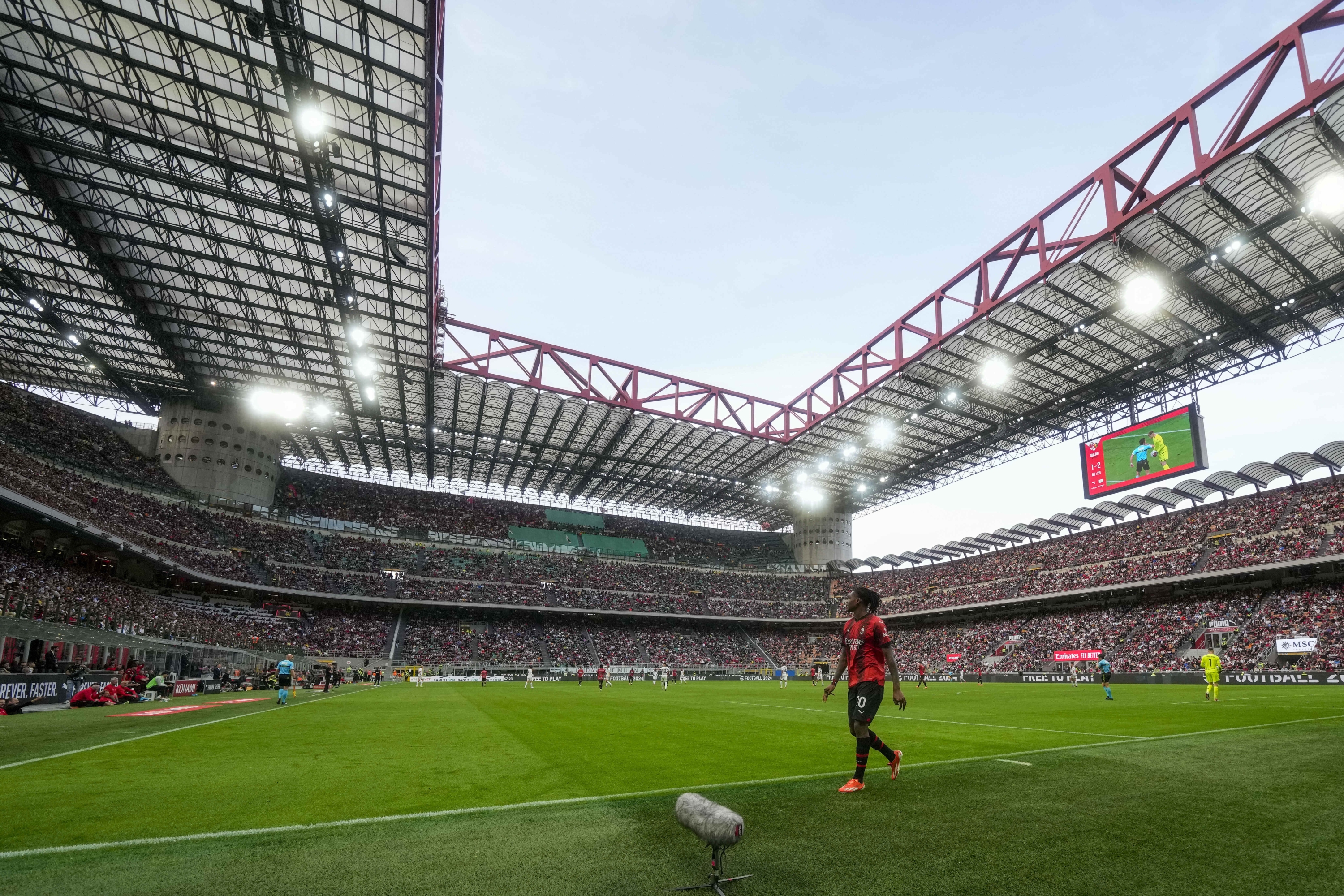 AC Milan's Rafael Leao leaves the field during a Serie A soccer match between AC Milan and Genoa, at the San Siro stadium in Milan, Italy, Sunday, May 5, 2024. (AP Photo/Luca Bruno)