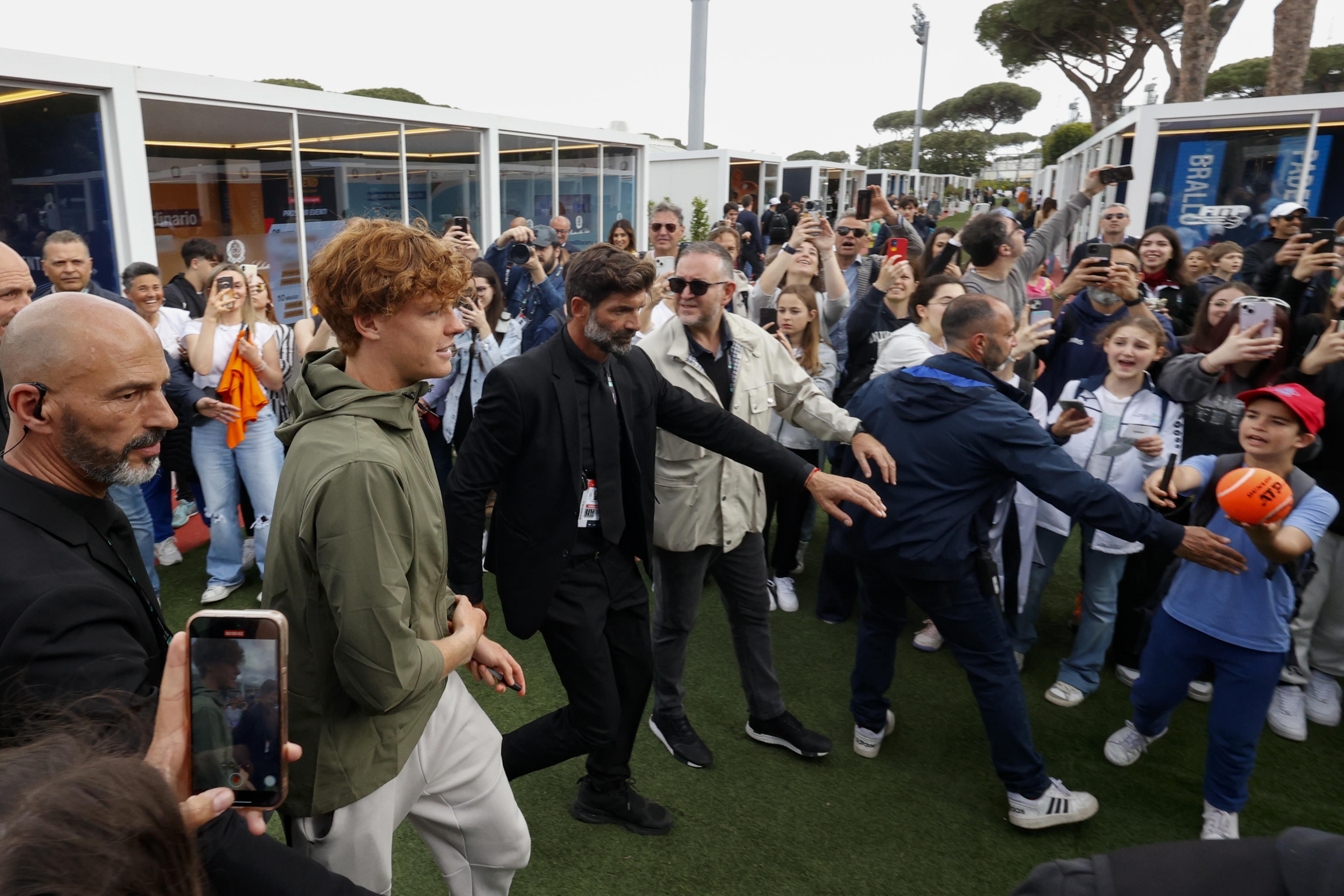 Jannik Sinner of Italy with fans at the Italian Open tennis tournament in Rome, Italy, 07 May 2024.Sinner announced he will not play at the upcoming Italian Open tennis tournament due to a hip injury.  ANSA/FABIO FRUSTACI