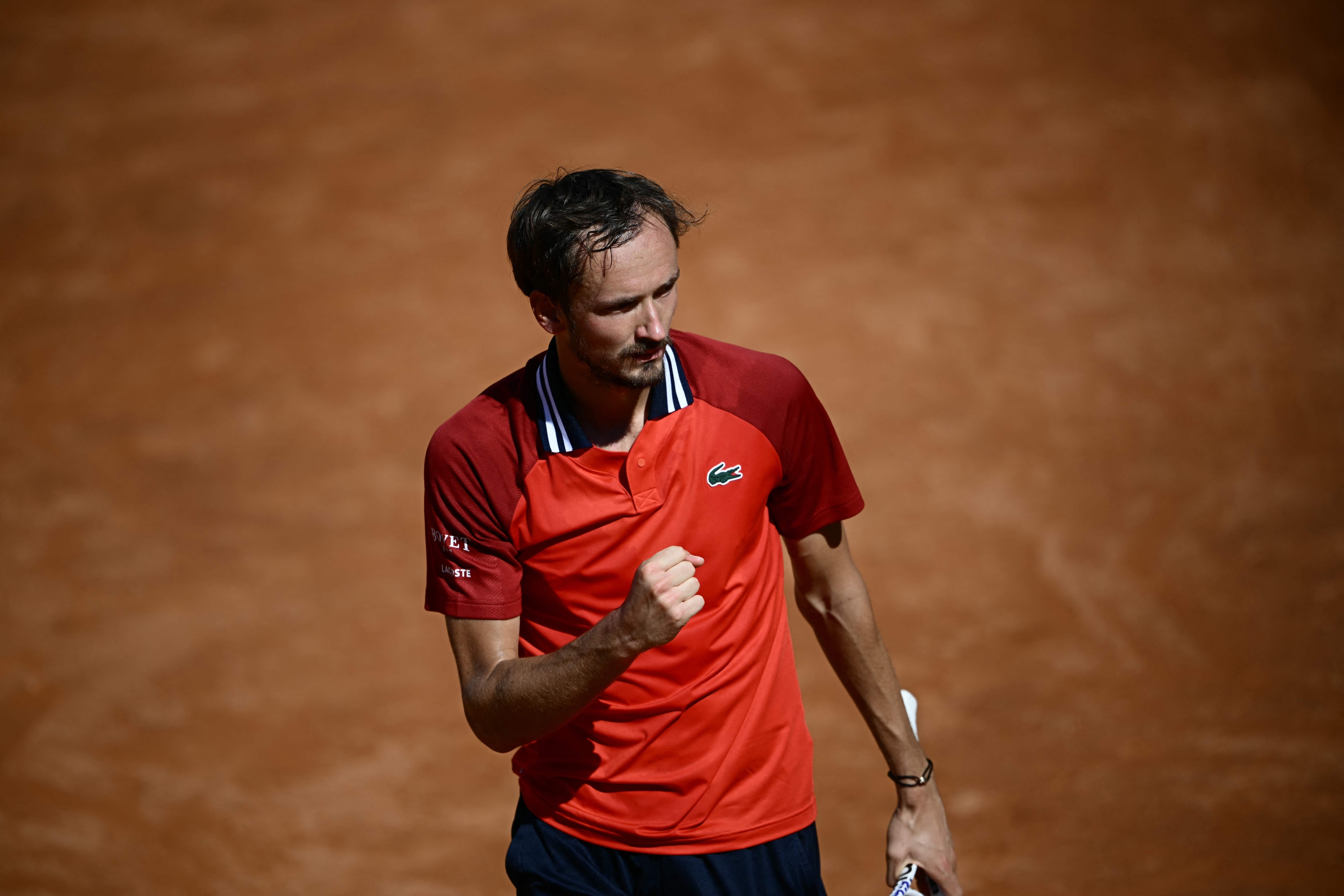 Russia's Daniil Medvedev celebrates a point against Great Britain's Jack Draper during the Men's ATP Rome Open tennis tournament at Foro Italico in Rome on May 11, 2024. (Photo by Filippo MONTEFORTE / AFP)