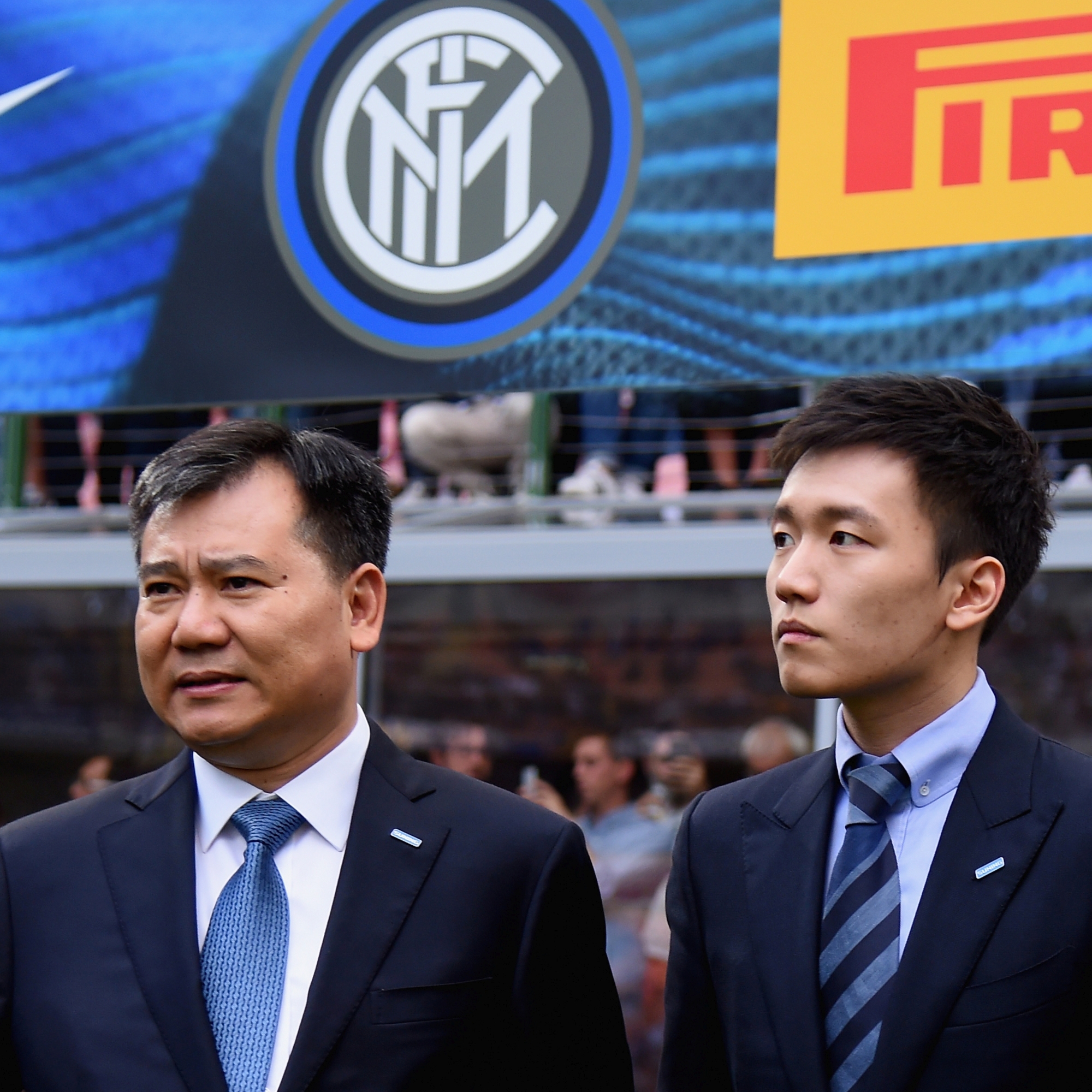 MILAN, ITALY - SEPTEMBER 18:  FC Internazionale board member Steven Zhang (R) and chairman of Suning holdings group Zhang Jindong chat prior to the Serie A match between FC Internazionale and Juventus FC at Stadio Giuseppe Meazza on September 18, 2016 in Milan, Italy.  (Photo by Claudio Villa - Inter/FC Internazionale via Getty Images)