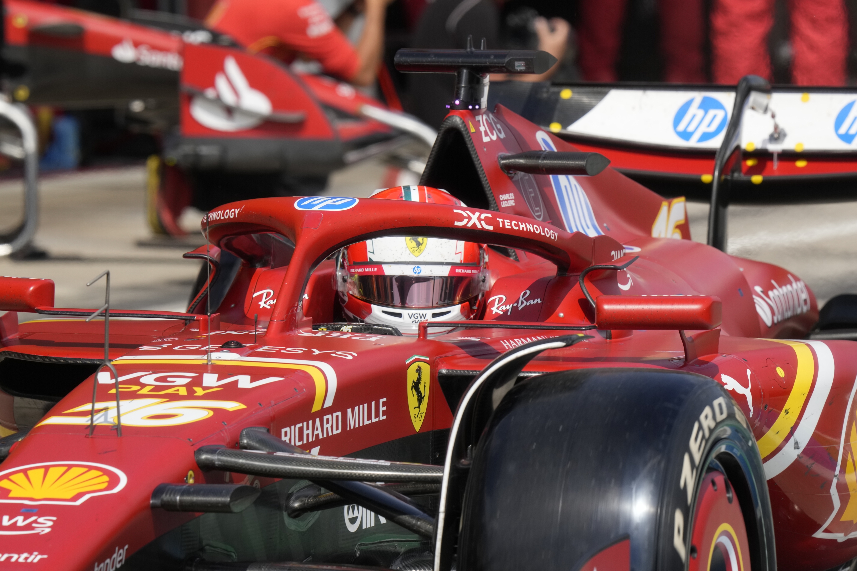 Ferrari driver Charles Leclerc of Monaco steers his car after a pit service during the Italy's Emilia Romagna Formula One Grand Prix race at the Dino and Enzo Ferrari racetrack in Imola, Italy, Sunday, May 19, 2024. (AP Photo/Luca Bruno, Pool)