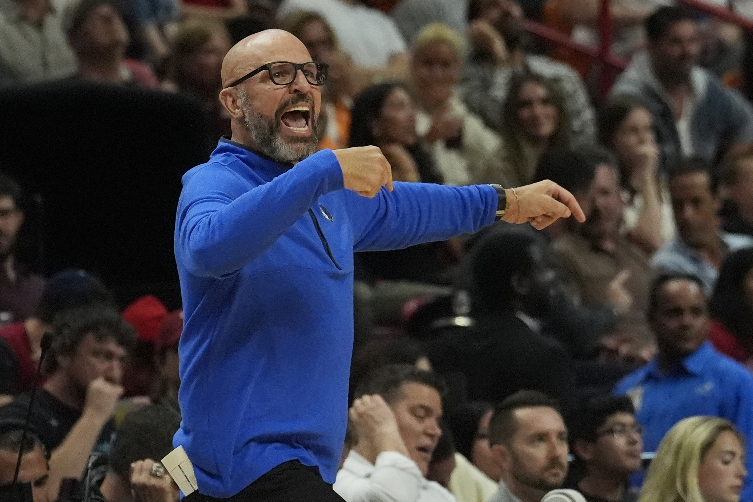 Dallas Mavericks head coach Jason Kidd gestures during the first half of an NBA basketball game against the Miami Heat, Wednesday, April 10, 2024, in Miami. (AP Photo/Marta Lavandier)