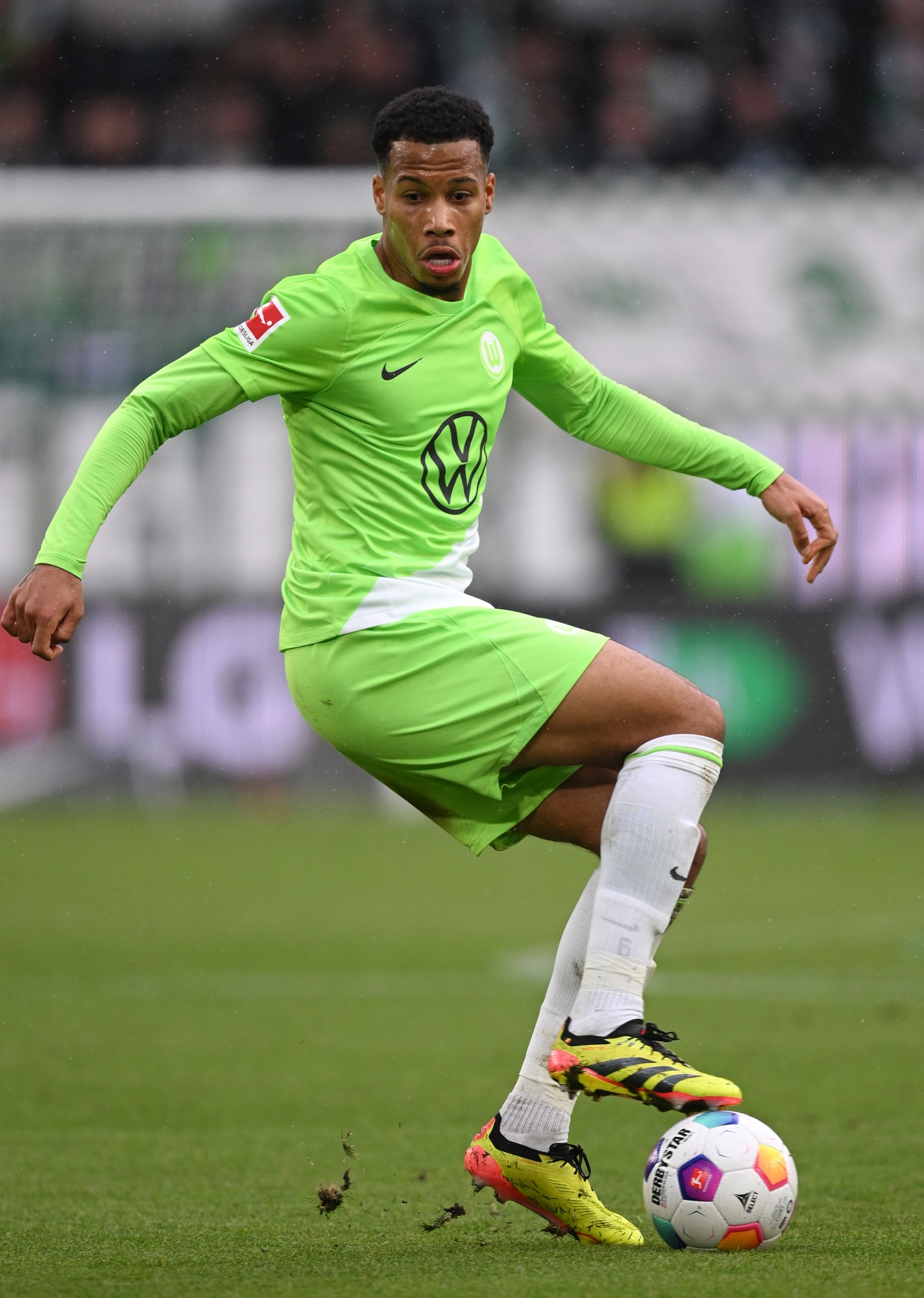 WOLFSBURG, GERMANY - APRIL 20: Aster Vranckx of Wolfsburg in action during the Bundesliga match between VfL Wolfsburg and VfL Bochum 1848 at Volkswagen Arena on April 20, 2024 in Wolfsburg, Germany. (Photo by Stuart Franklin/Getty Images)