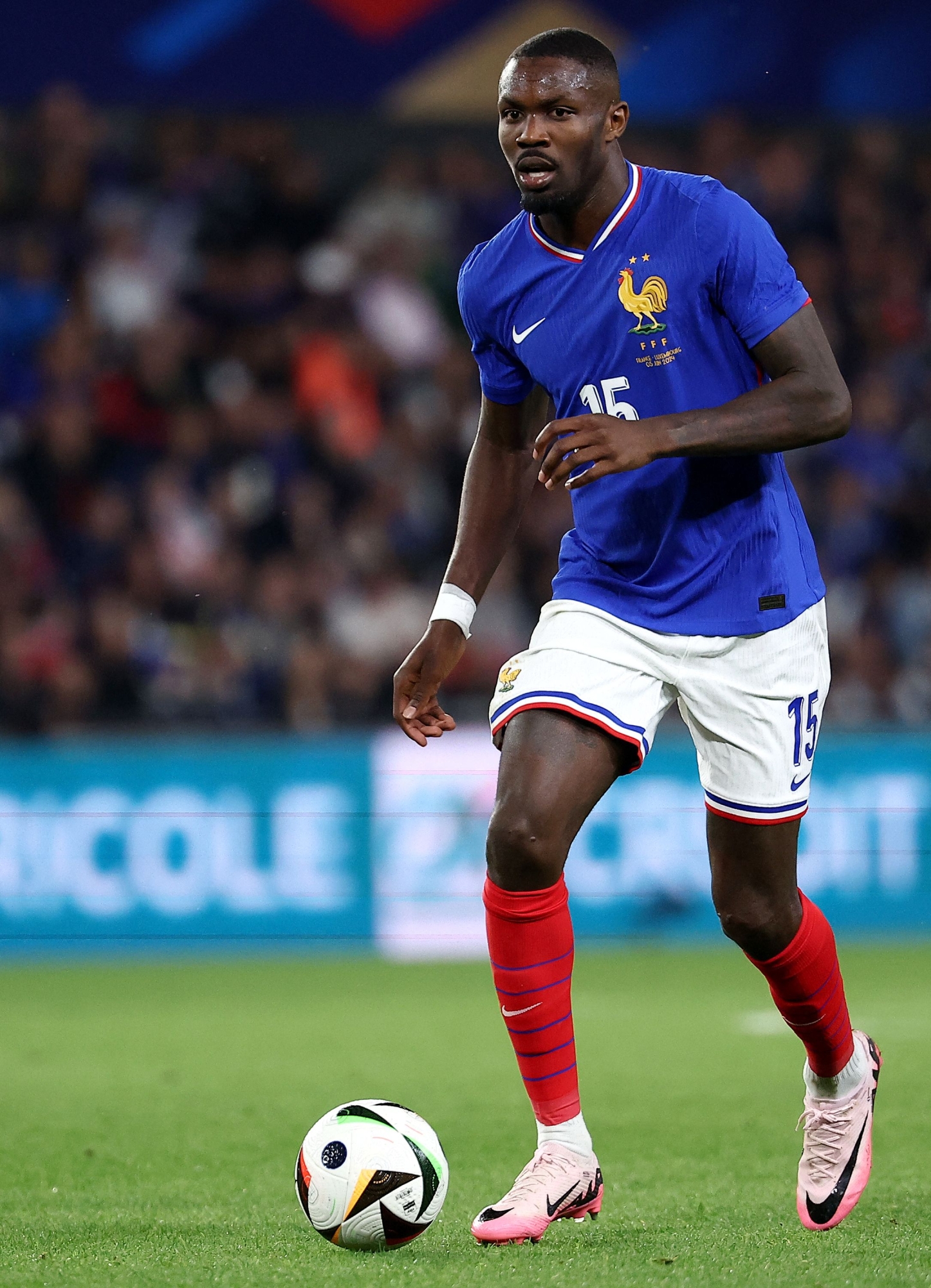 (FILES) France's forward Marcus Thuram controls the ball during the International friendly football match between France and Luxembourg at Saint-Symphorien Stadium in Longeville-les-Metz, eastern France, on June 5, 2024. "We have to fight to prevent the far-right party Rassemblement National (RN) from passing", France's French forward football player Marcus Thuram said on June 15, 2024, ahead of France's snap elections for a new National Assembly, in the wake of a European poll defeat at the hands of the far right. (Photo by FRANCK FIFE / AFP)