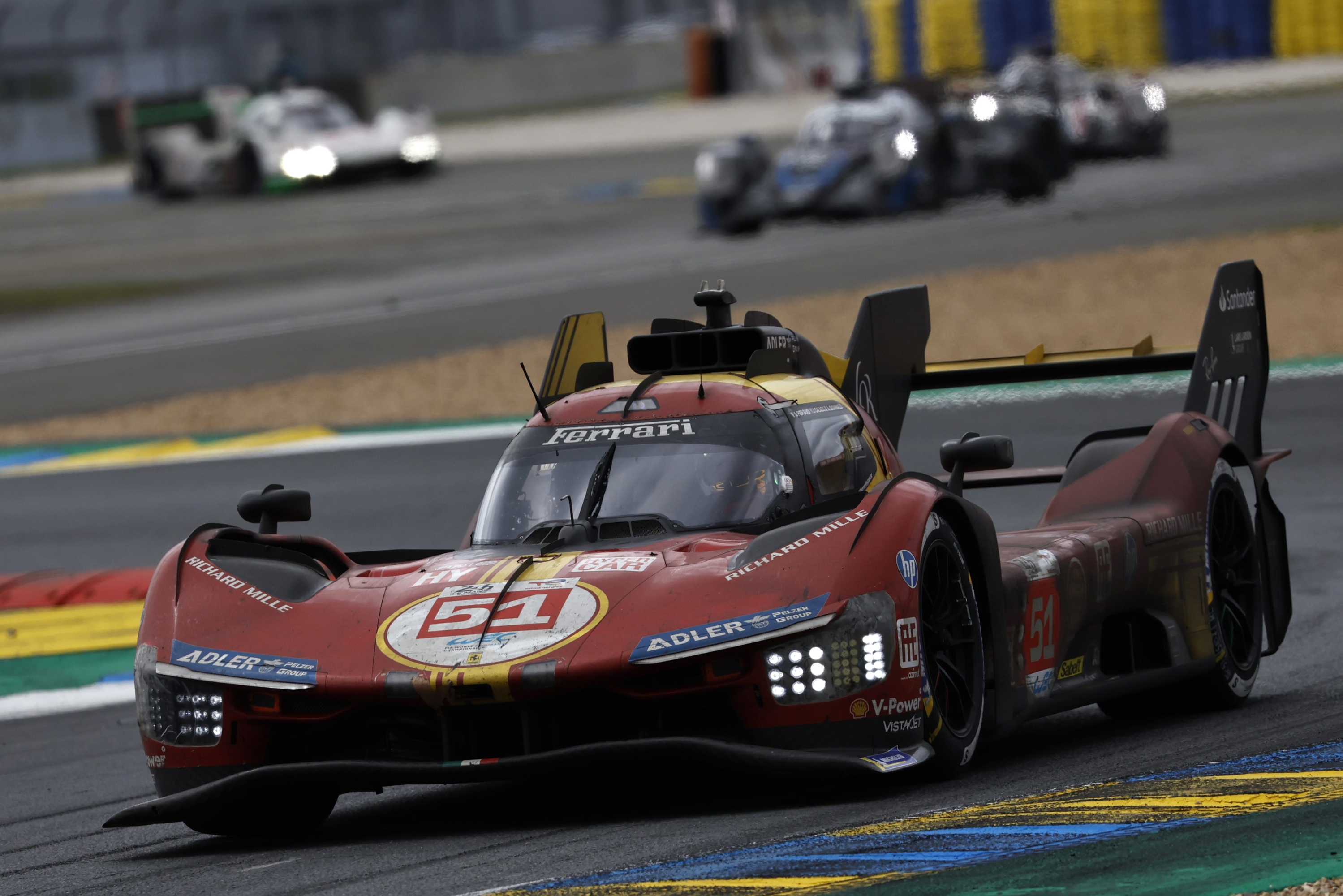The Ferrari AF Corse team car, a Ferrari 499, driven by Italy's Alessandro Pier Guidi, Britain's James Calado and Italy's Antonio Giovinazzi during the 24-hour Le Mans endurance race in Le Mans, western France, Sunday, June 16, 2024. (AP Photo/Jeremias Gonzalez)