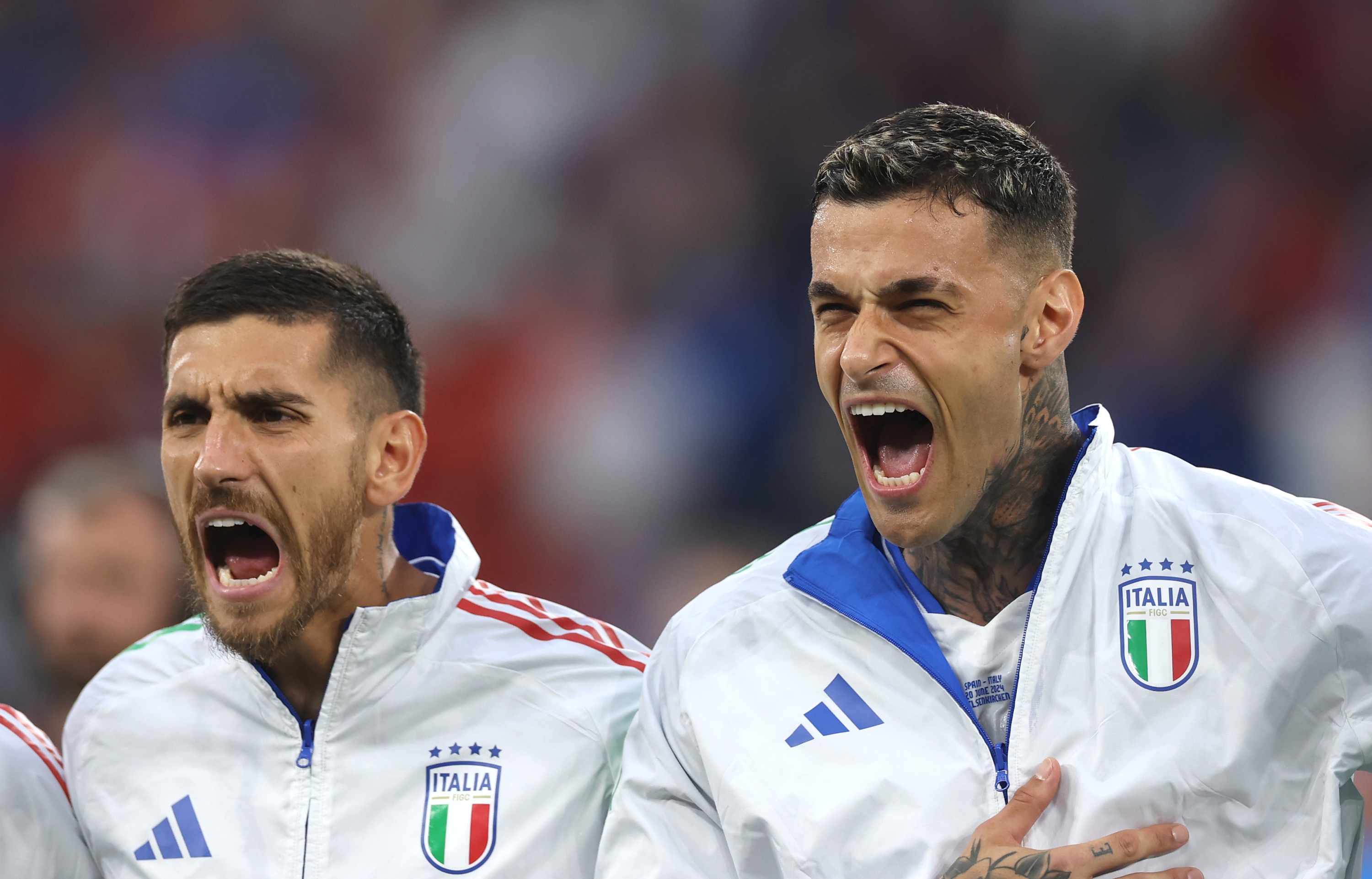 GELSENKIRCHEN, GERMANY - JUNE 20: Gianluca Scamacca of Italy reacts as he sings their national anthem with teammates prior to the UEFA EURO 2024 group stage match between Spain and Italy at Arena AufSchalke on June 20, 2024 in Gelsenkirchen, Germany. (Photo by Lars Baron/Getty Images)
